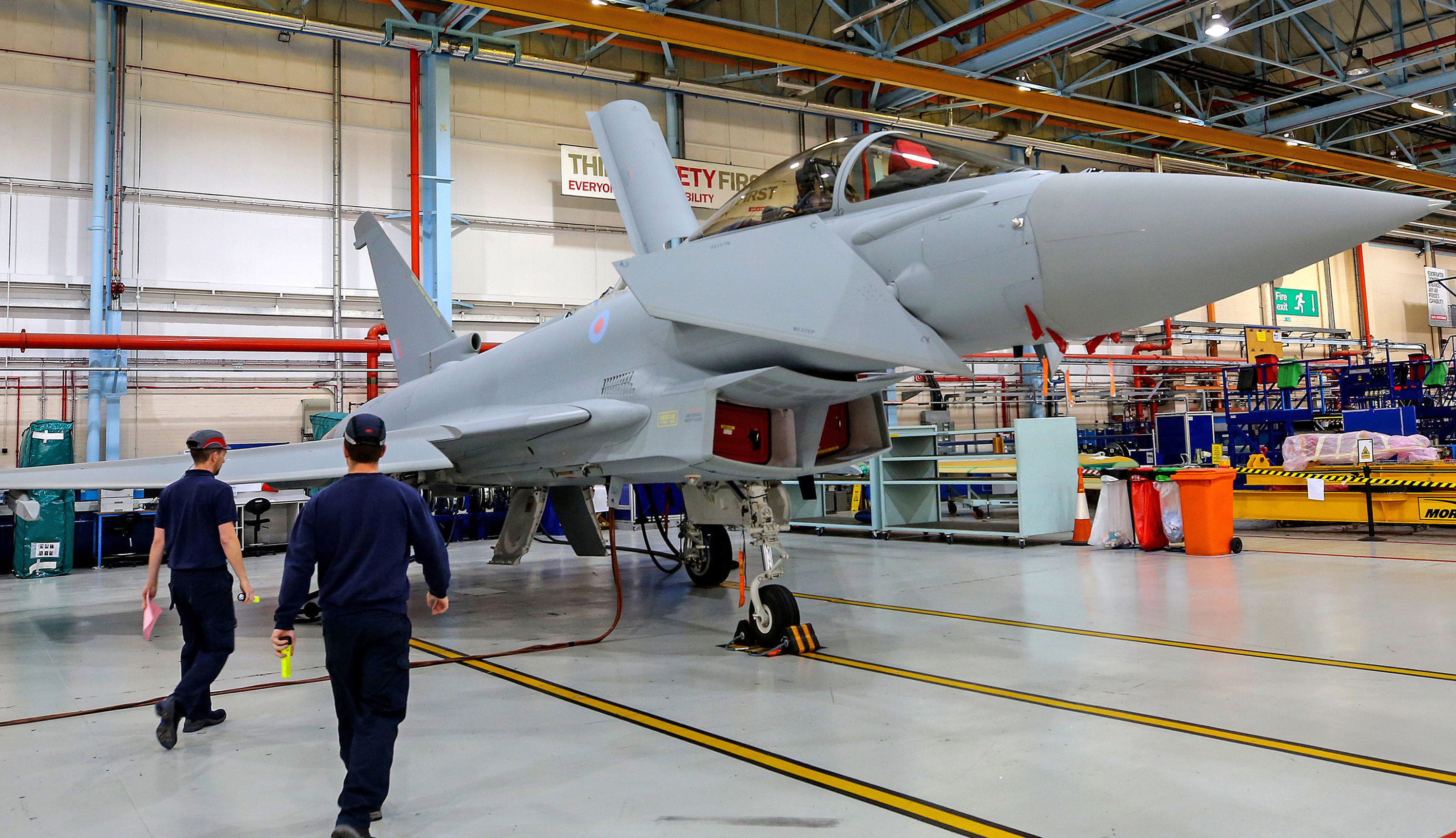 Cover image: Staff at BAE Warton in Lancashire (Picture: PA).