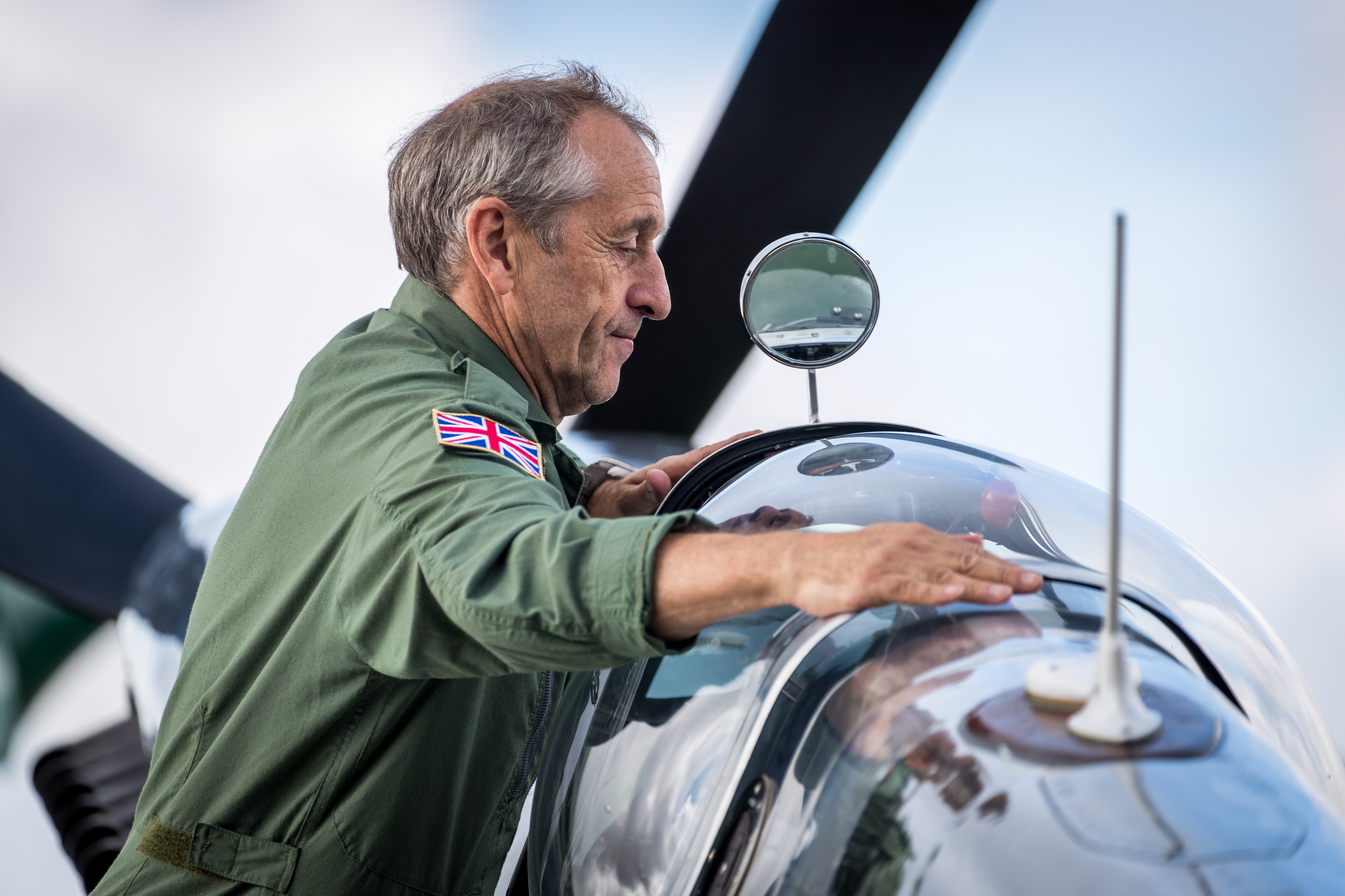 Steve Brooks inspects the Silver Spitfire before it embarks from Goodwood Aerodrome 050819 CREDIT MOD
