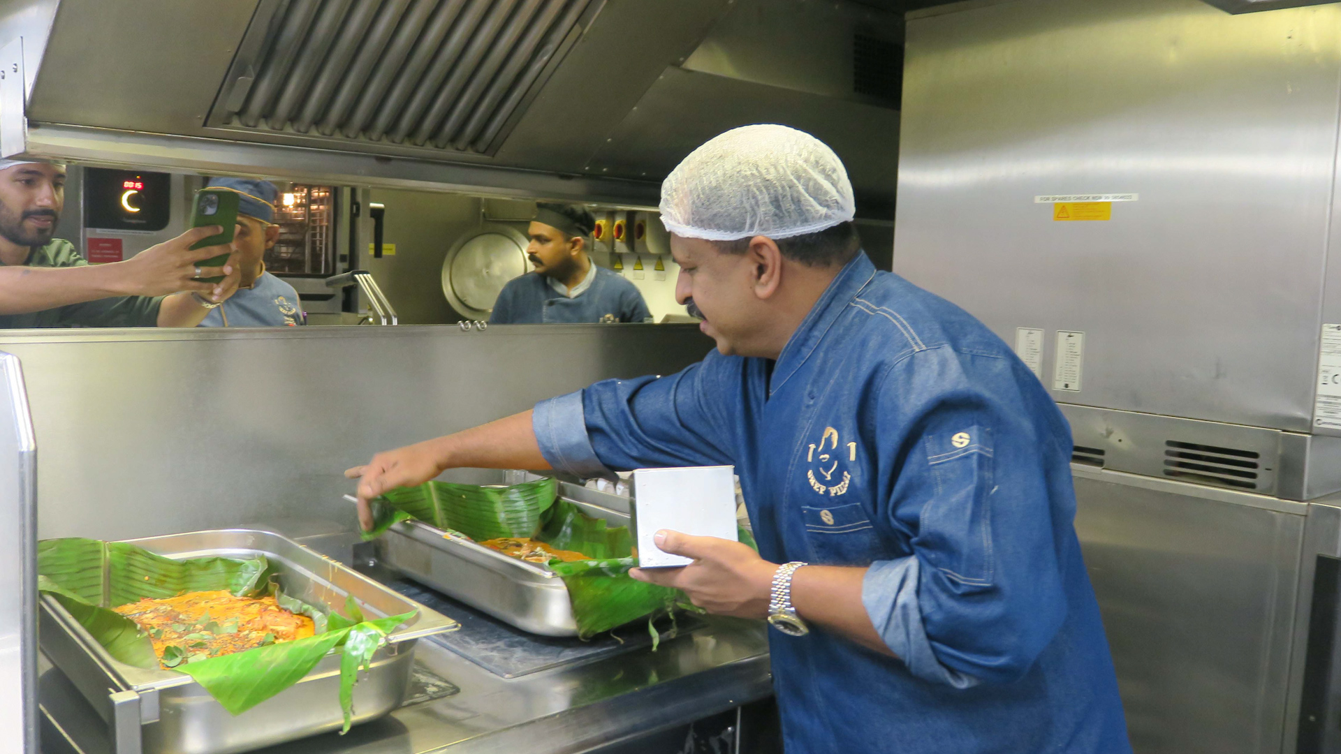 Suresh Pillai, also known as Chef Pillai, served a Michelin-starred meal to 200 sailors and marines on board HMS Lancaster during their visit to India (Picture: Royal Navy).