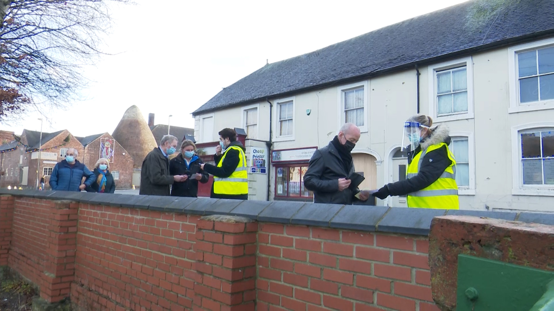 South Derbyshire residents queuing outside Grove Hall, Swadlincote, for COVID-19 testing.