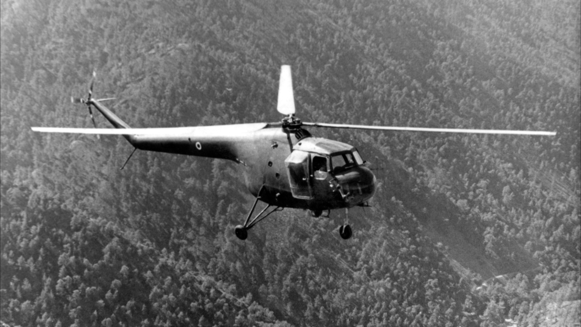 Sycamore 284 Squadron helicopter flies over Cyrpus mountains