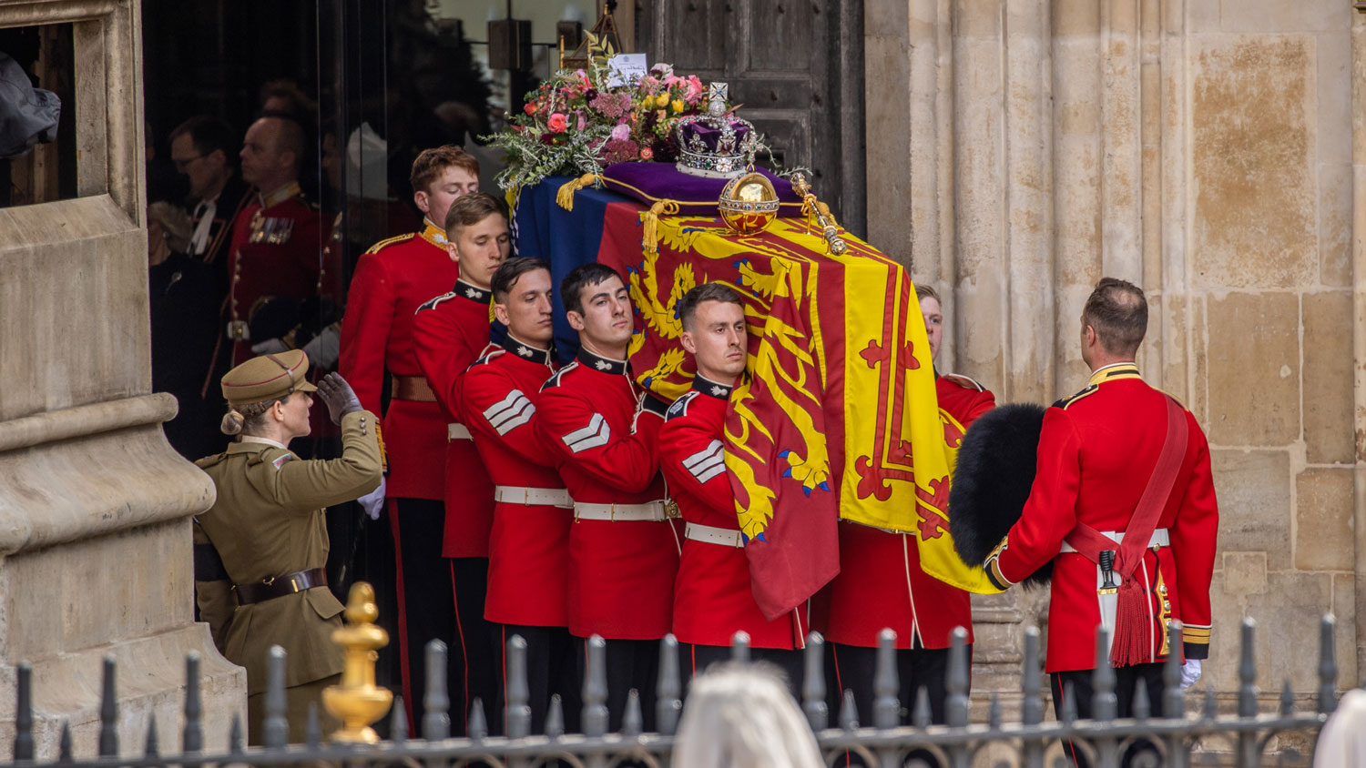 The Bearer Party formed of personnel from The Queen’s Company, 1st Battalion The Grenadier Guards move the coffin of Her Majesty The Queen to the State Gun Carriage 190922 CREDIT Crown Copyright