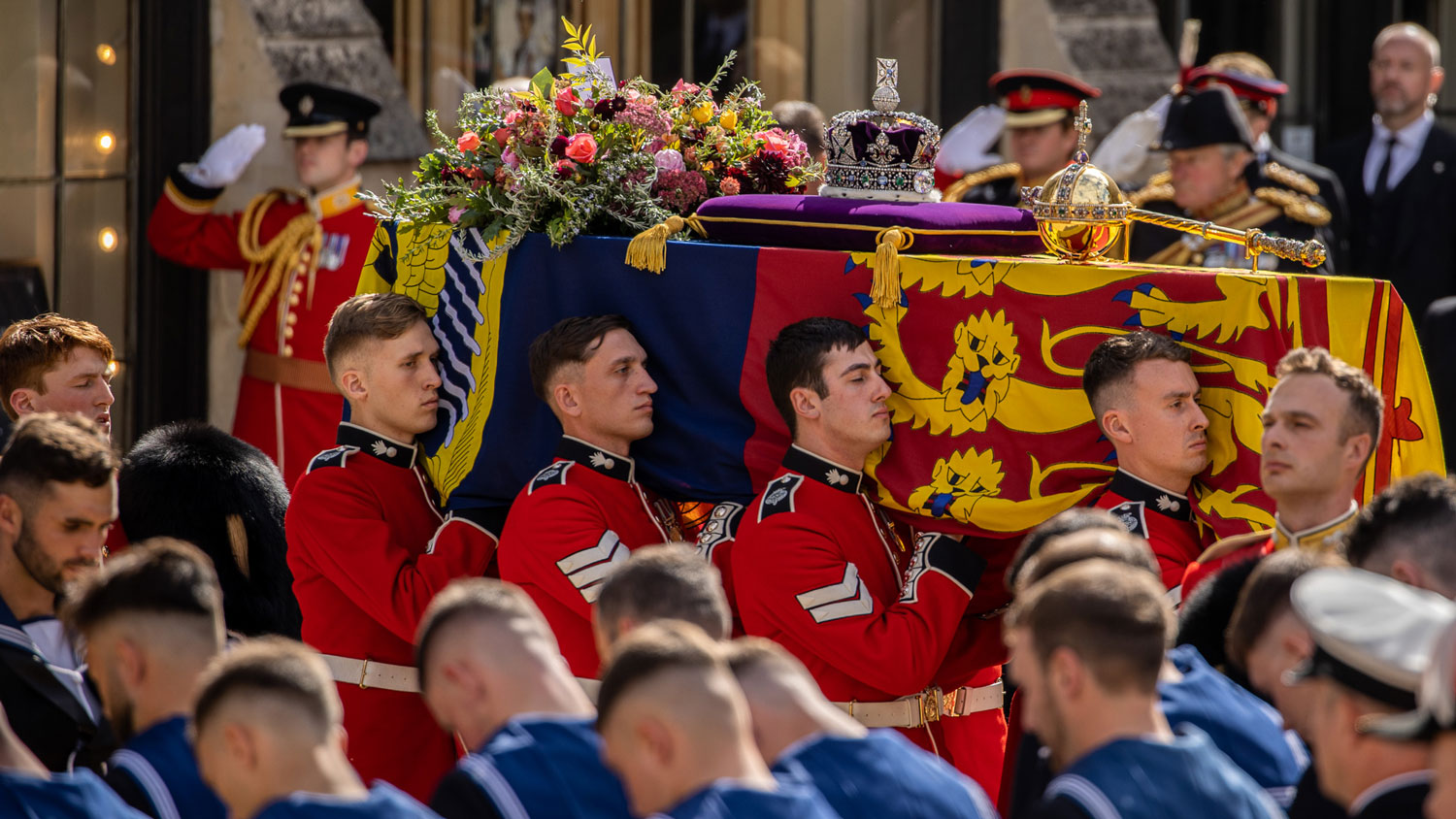 The Bearer Party formed of personnel from The Queen’s Company, 1st Battalion The Grenadier Guards move Queen Elizabeth II's coffin to the State Gun Carriage on 19th September 2022 (Picture: Crown Copyright).