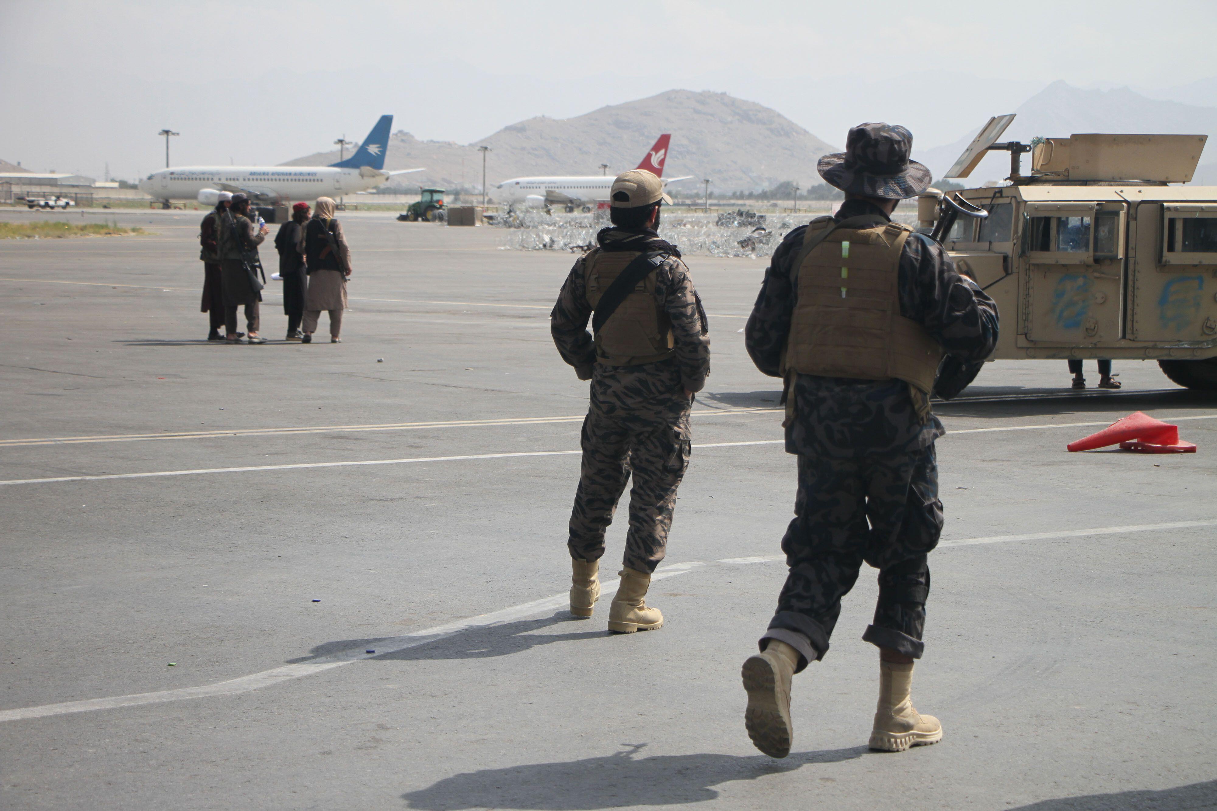 Taliban members at Kabul airport in Afghanistan