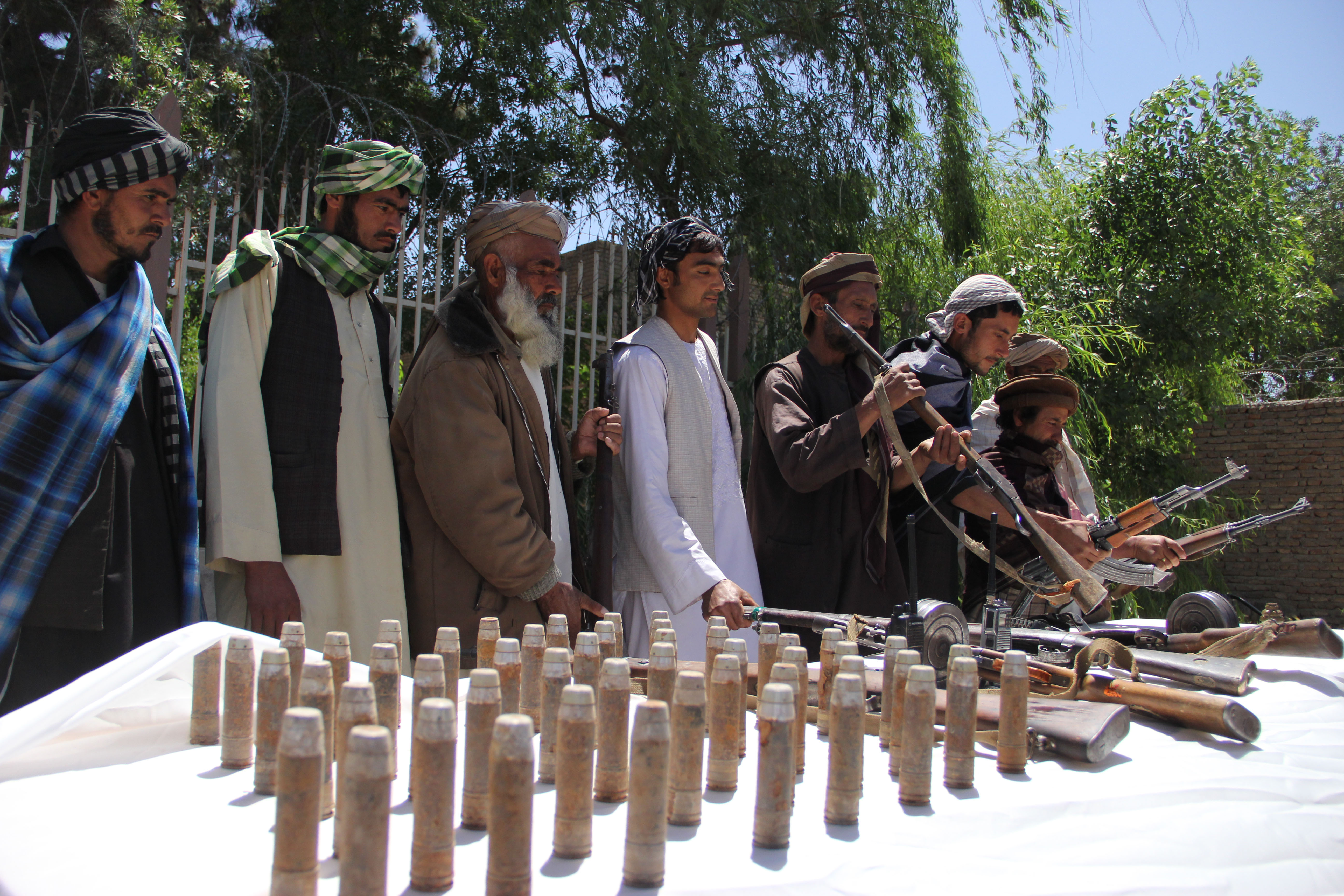 Taliban militants pictured in 2013 at a peace process meeting in Heart province. Picture: Farhad Hashimi / Alamy.