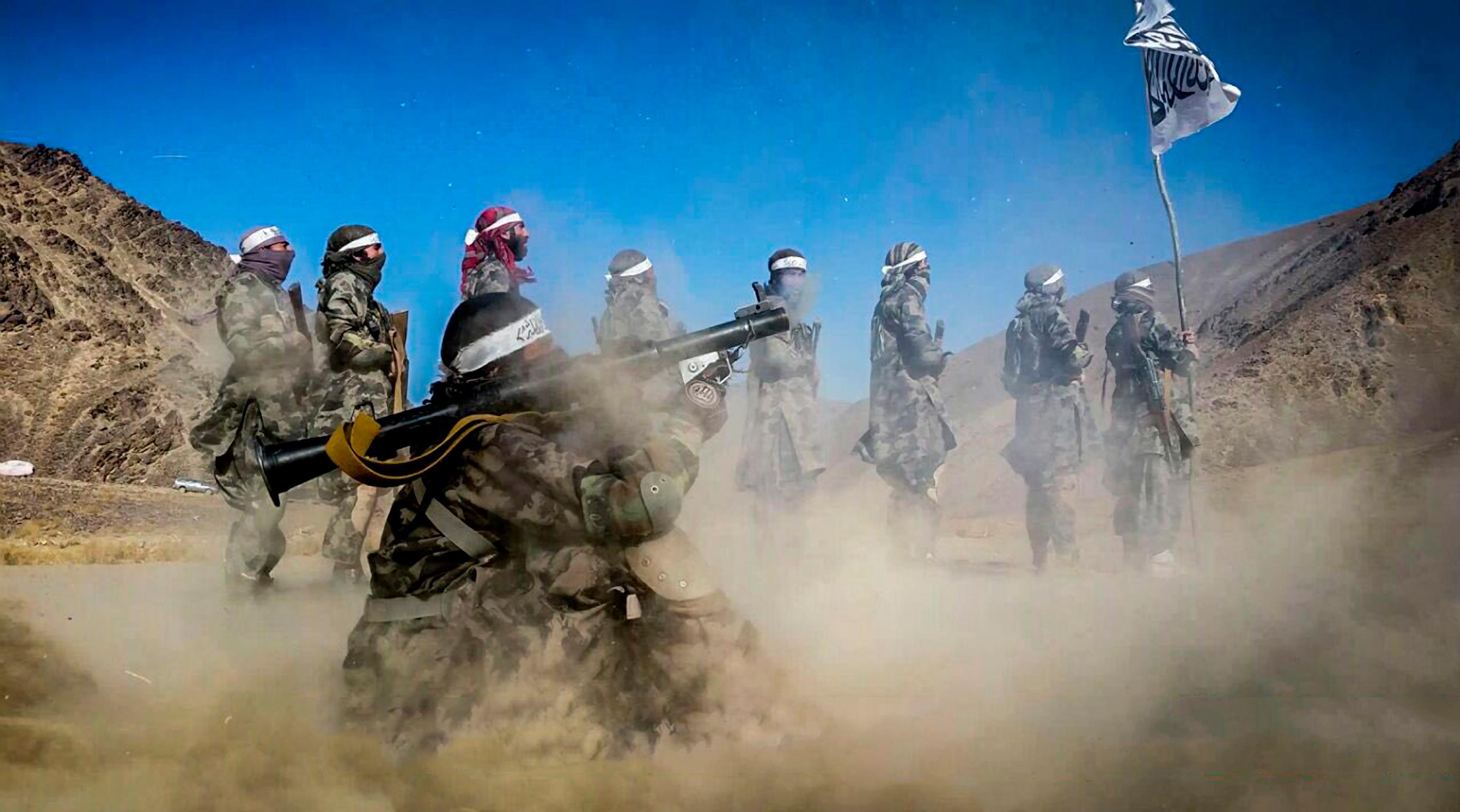 Still image taken from a propaganda video released in 2018 showing Taliban fighters using RPG rockets in a training camp in Faryab Province, Afghanistan. Picture: Handout / Alamy.
