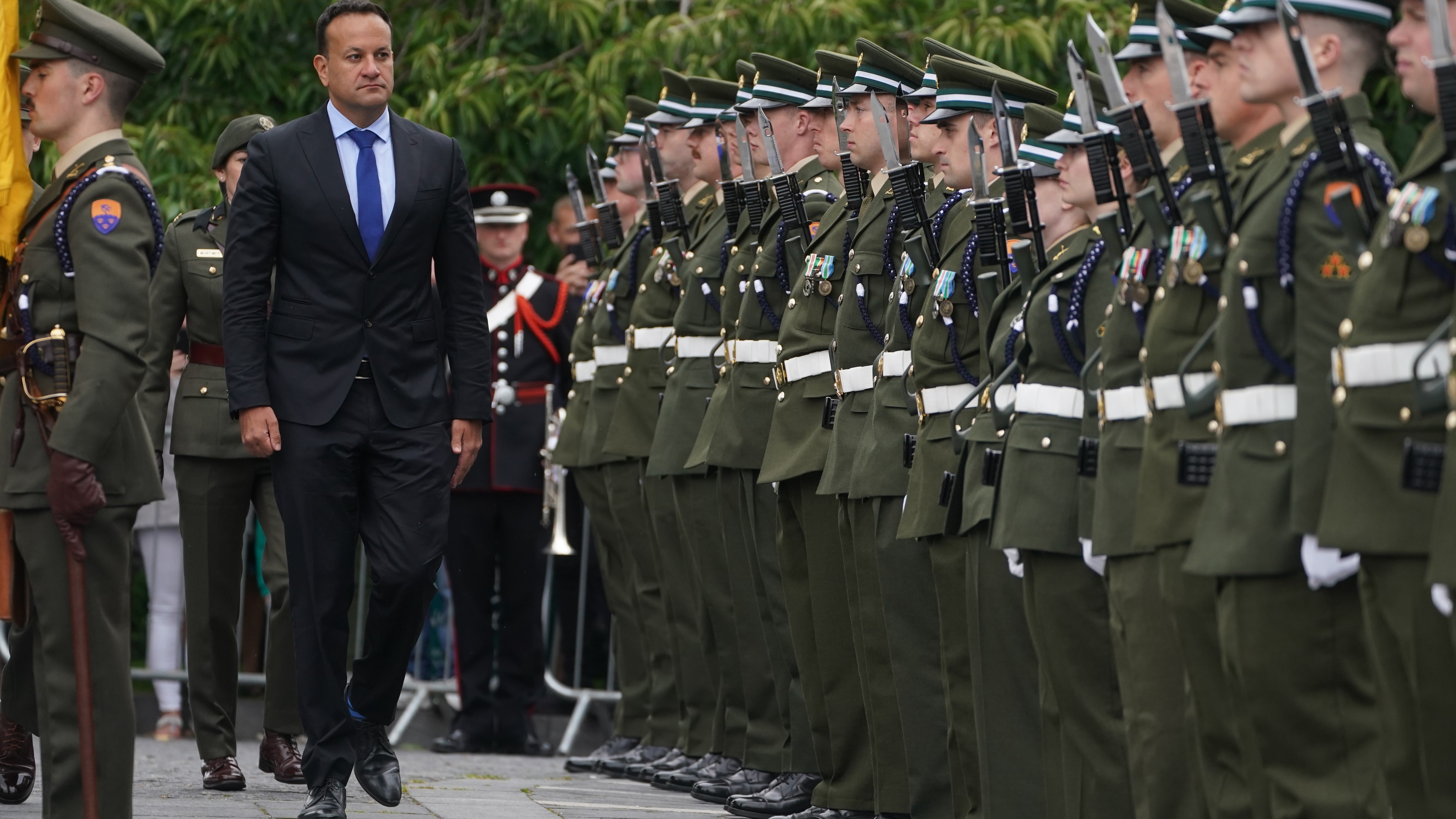 Taoiseach Leo Varadkar inspects a Guard of Honour during the rededication of the National Army Monument at Glasnevin Cemetery in Dublin CREDIT Brian Lawless PA Wire.jpg