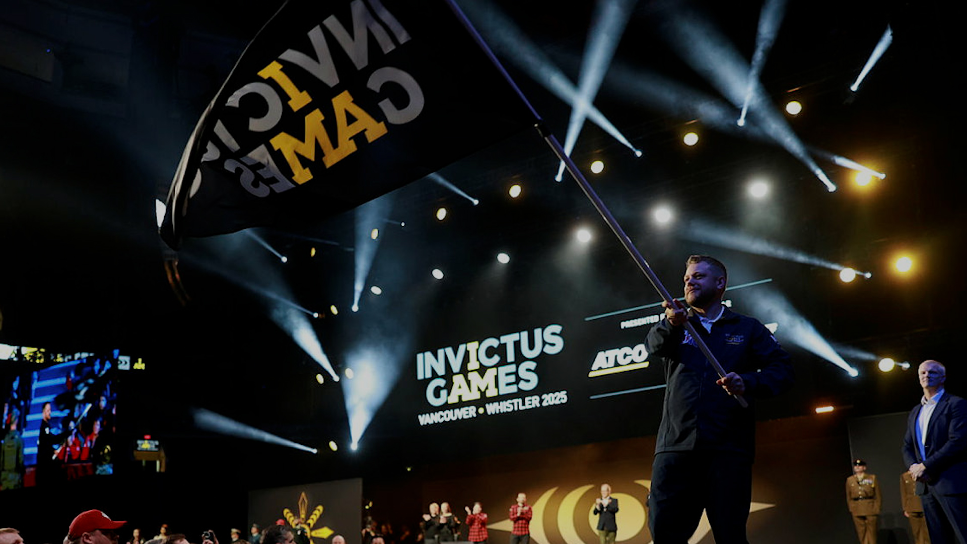 Team UK captain Stephen Hooper waves the Invictus Games