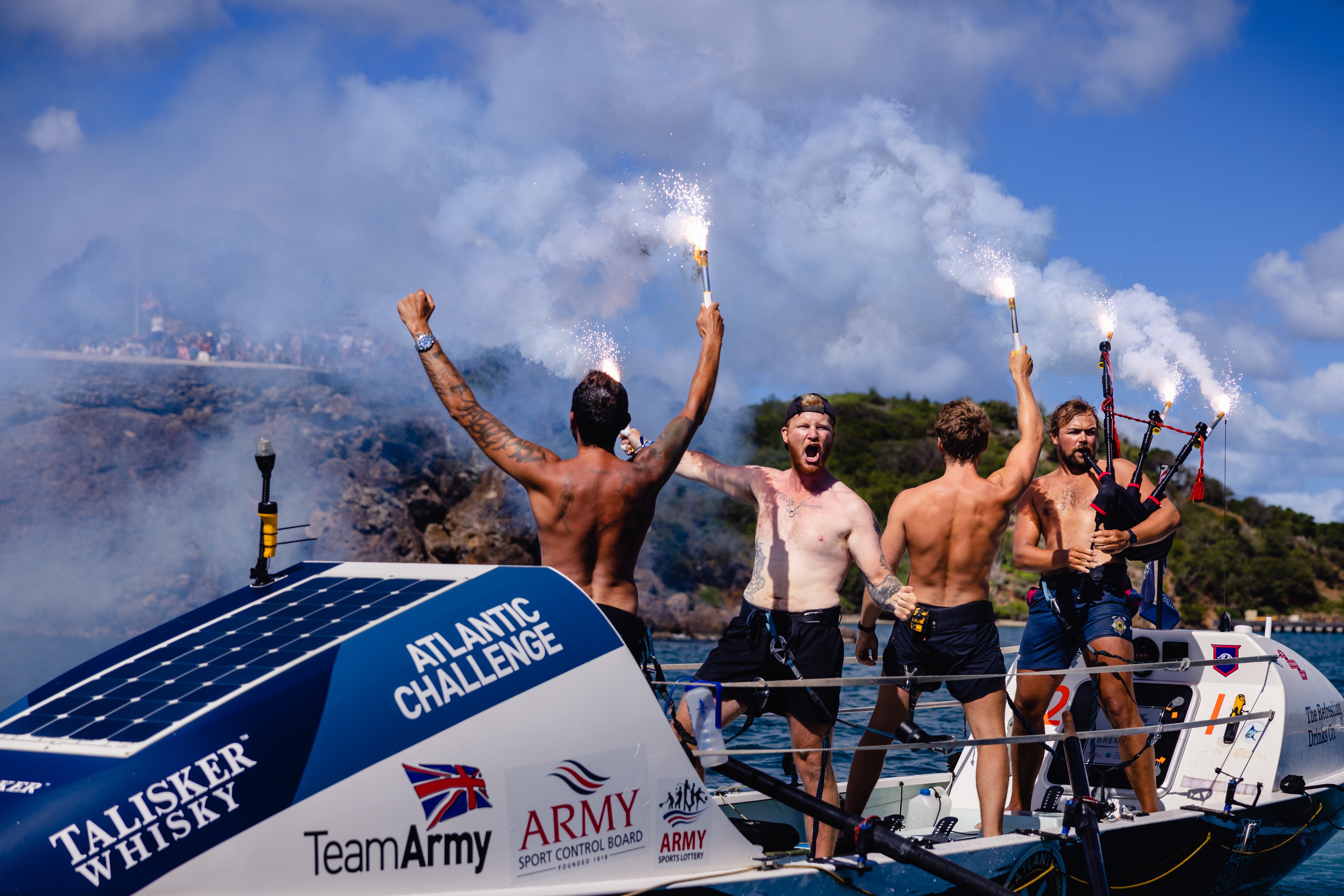 The Guardsmen, Max Lawrence, William Botes, James Tate, and Roland Walker have completed the Talisker Whisky Atlantic Challenge in 39-days (Picture: Talisker Whisky Atlantic Challenge).