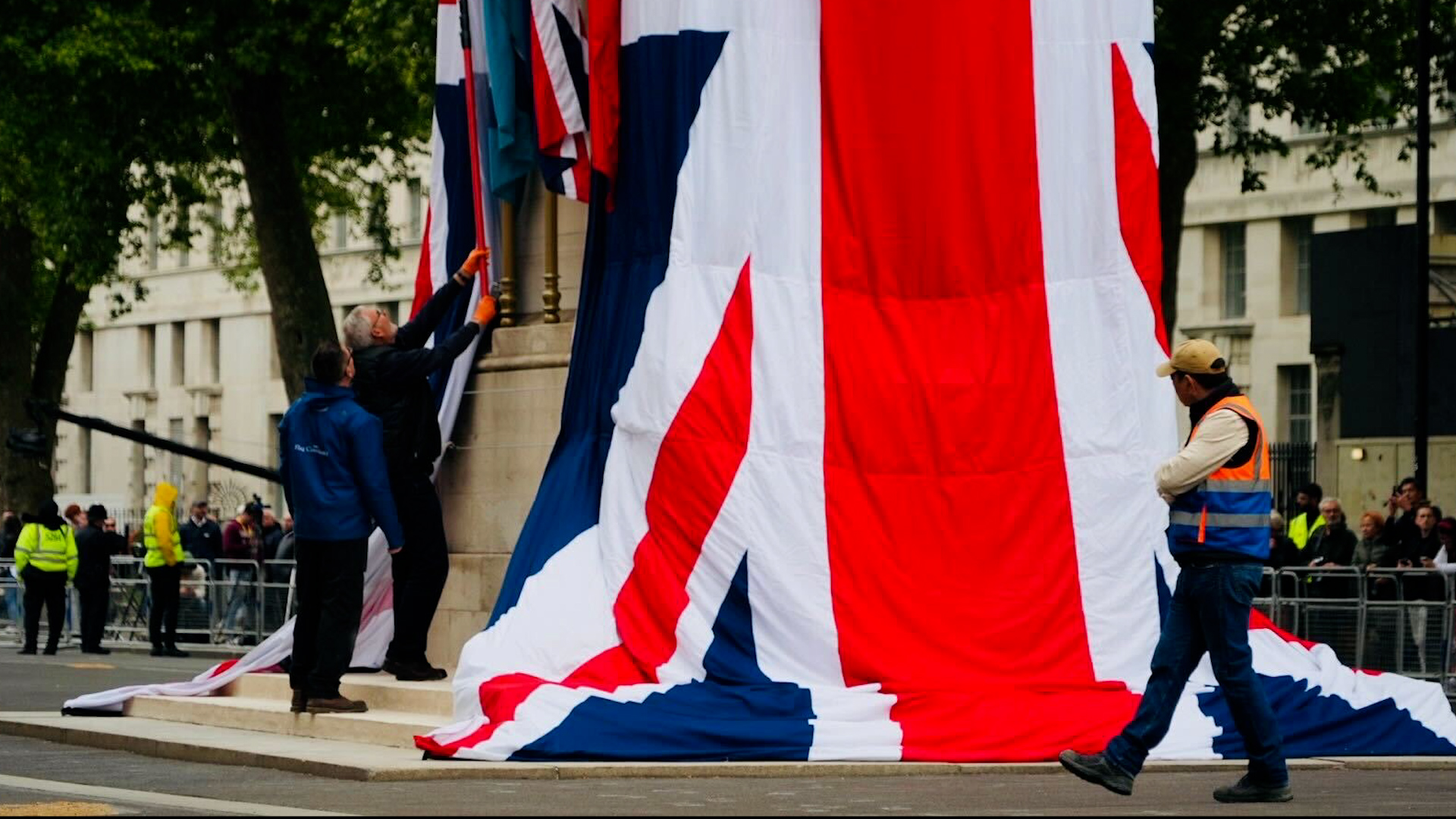 The Cenotaph being draped in Union Jack flags to mark VE Day 80 060525 CREDIT BFBS