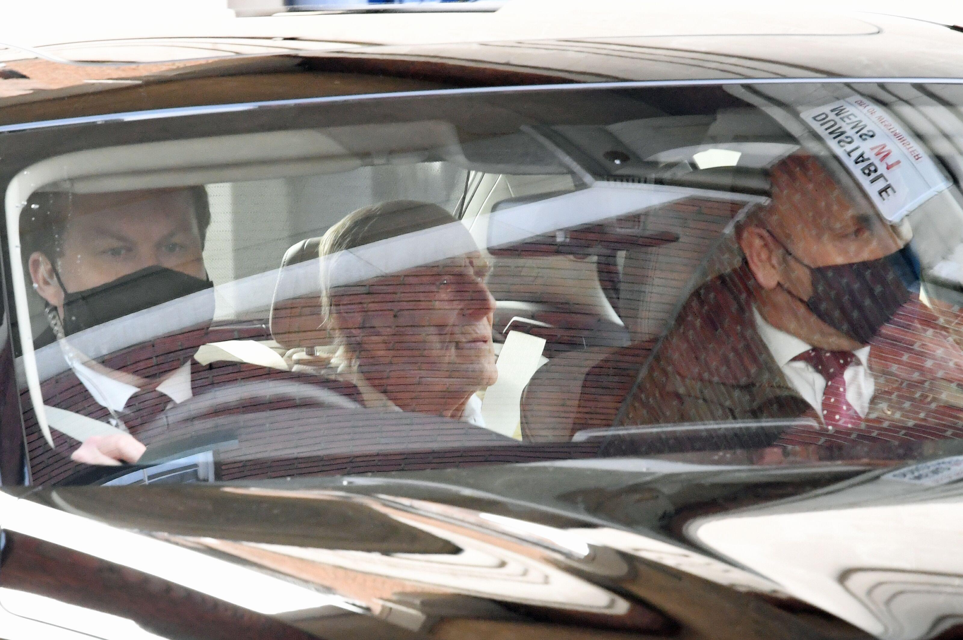 The Duke of Edinburgh is driven away in a car after leaving the King Edward VII's Hospital, London, where he has been recovering after heart surgery 160321 CREDIT PA Images Alamy stock images.jpg
