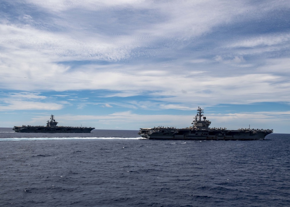 Cover image: USS Ronald Reagan and USS Nimitz in the South China Sea (Picture: US Department of Defense).
