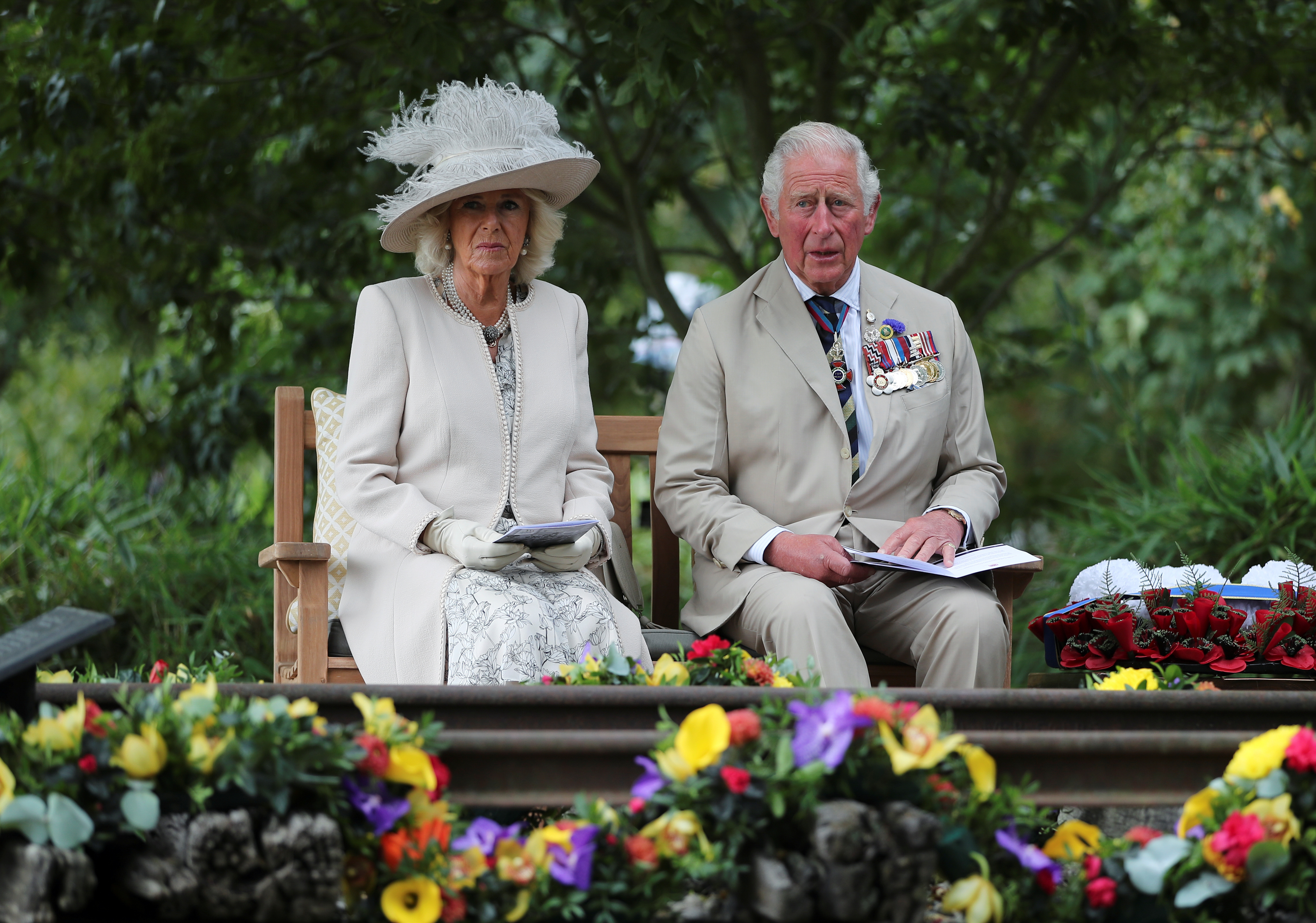 Prince Charles and Camilla led the nation's two-minute silence at 11am (Picture: PA).
