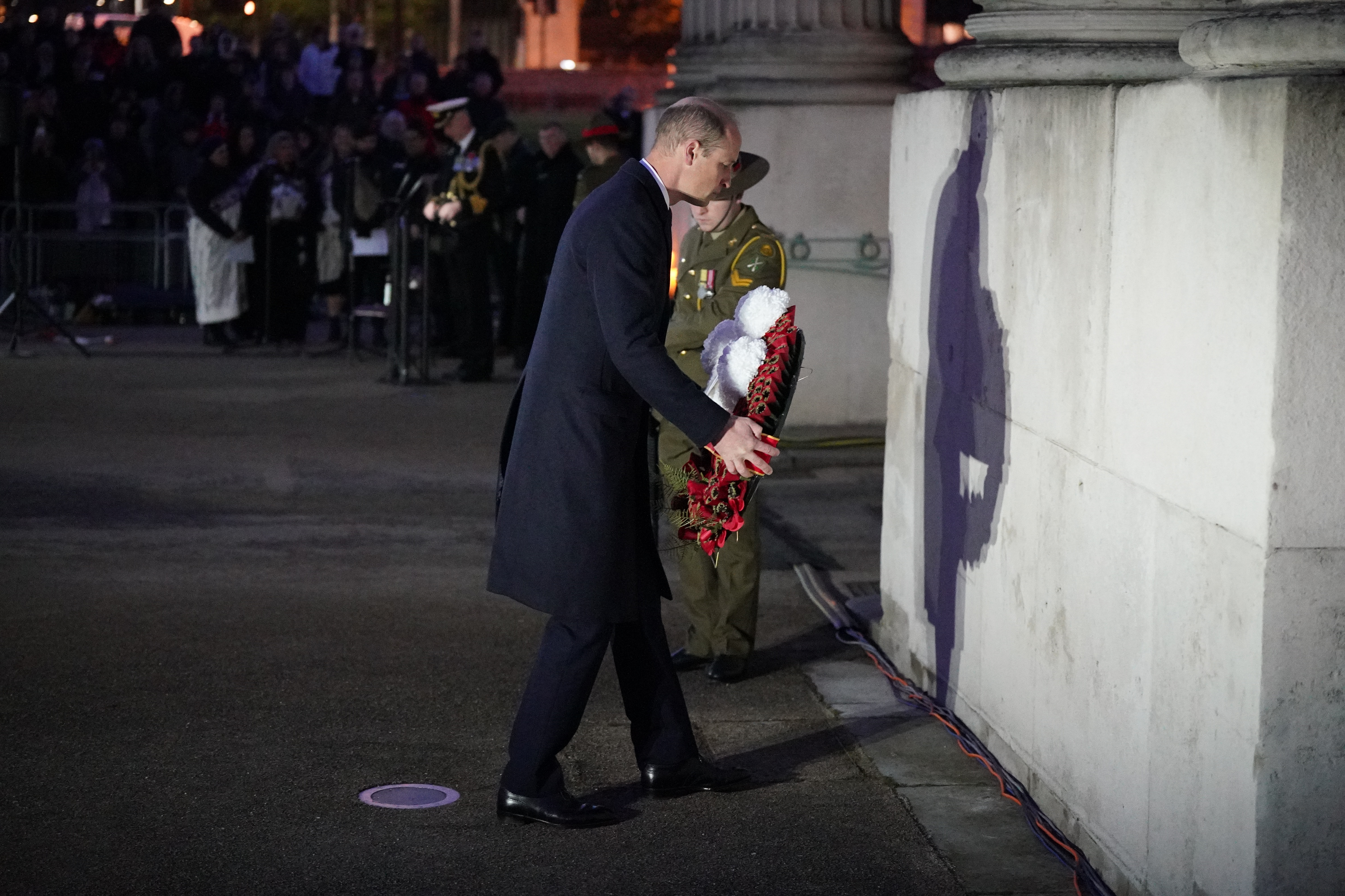 The Prince of Wales lays a wreath at the dawn service in commemoration for Anzac Day at the Australia Memorial at Hyde Park Corner in London.