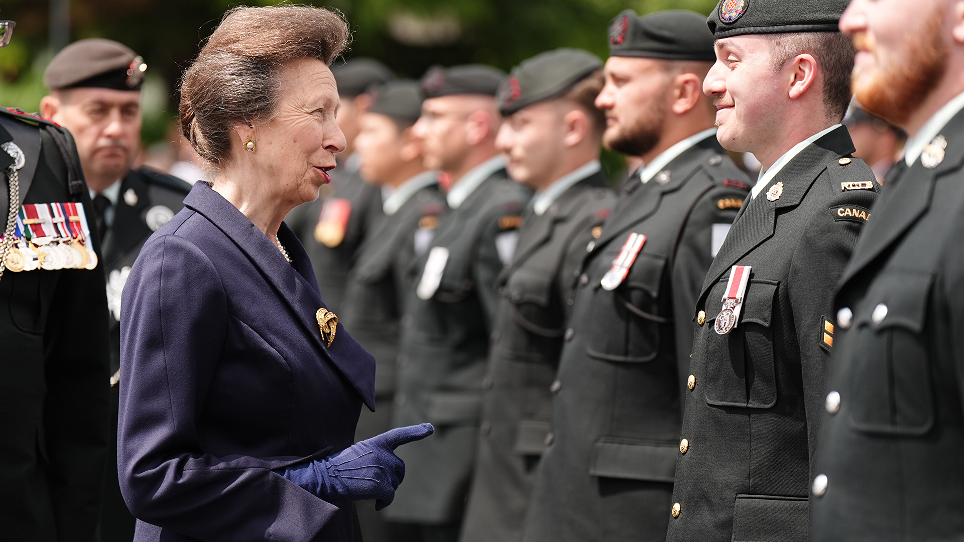 The Princess Royal inspecting the troops as she arrives to unveil a statue of a Second World War Canadian Royal Regina Rifleman during a reception with members of the regiment D-Day 050624 CREDIT PA