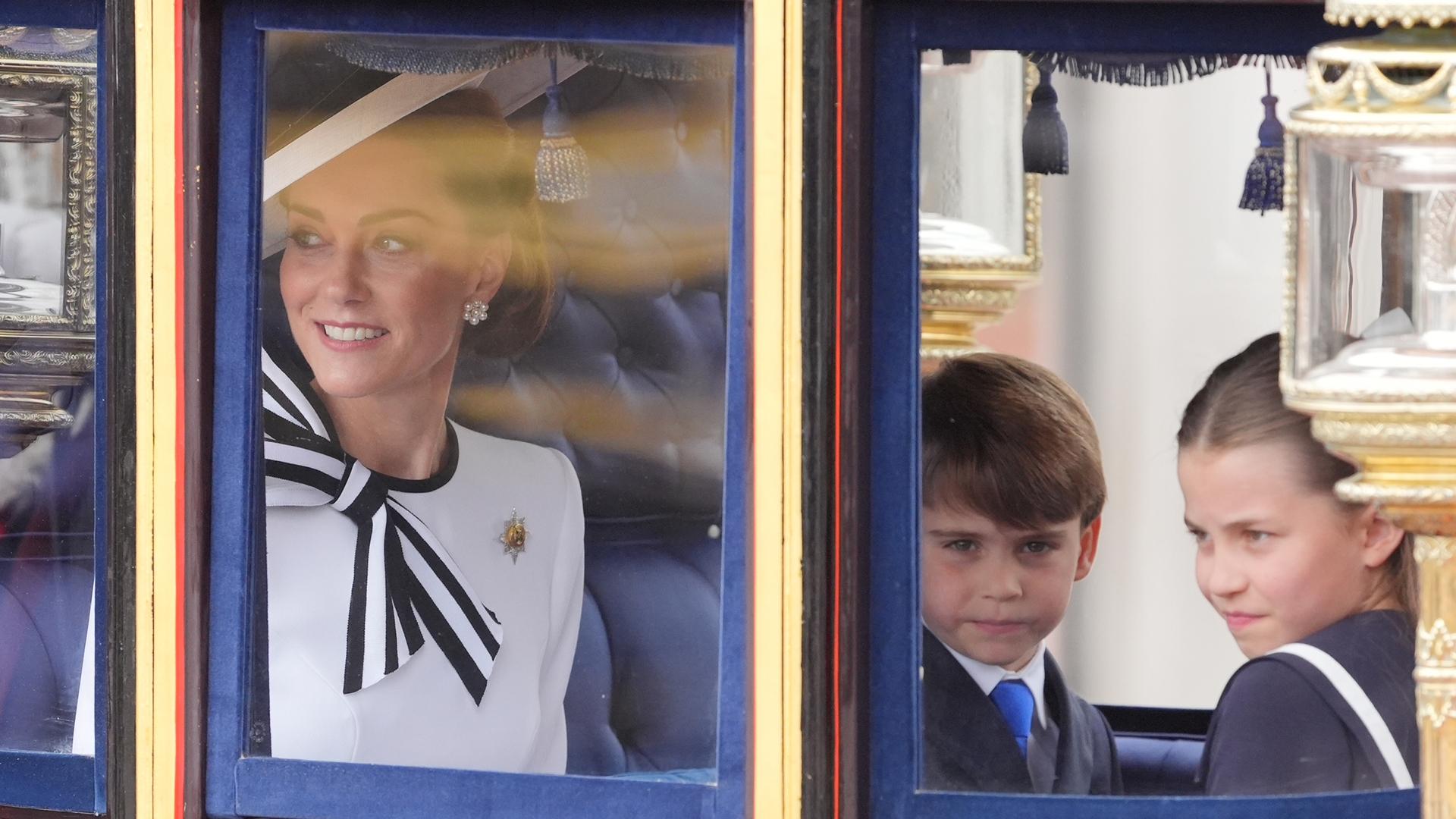 Kate wore the Irish Guards Regimental Brooch, as she is the regiment’s Colonel on a Jenny Packham dress with a hat by Philip Treacy (Picture: PA)