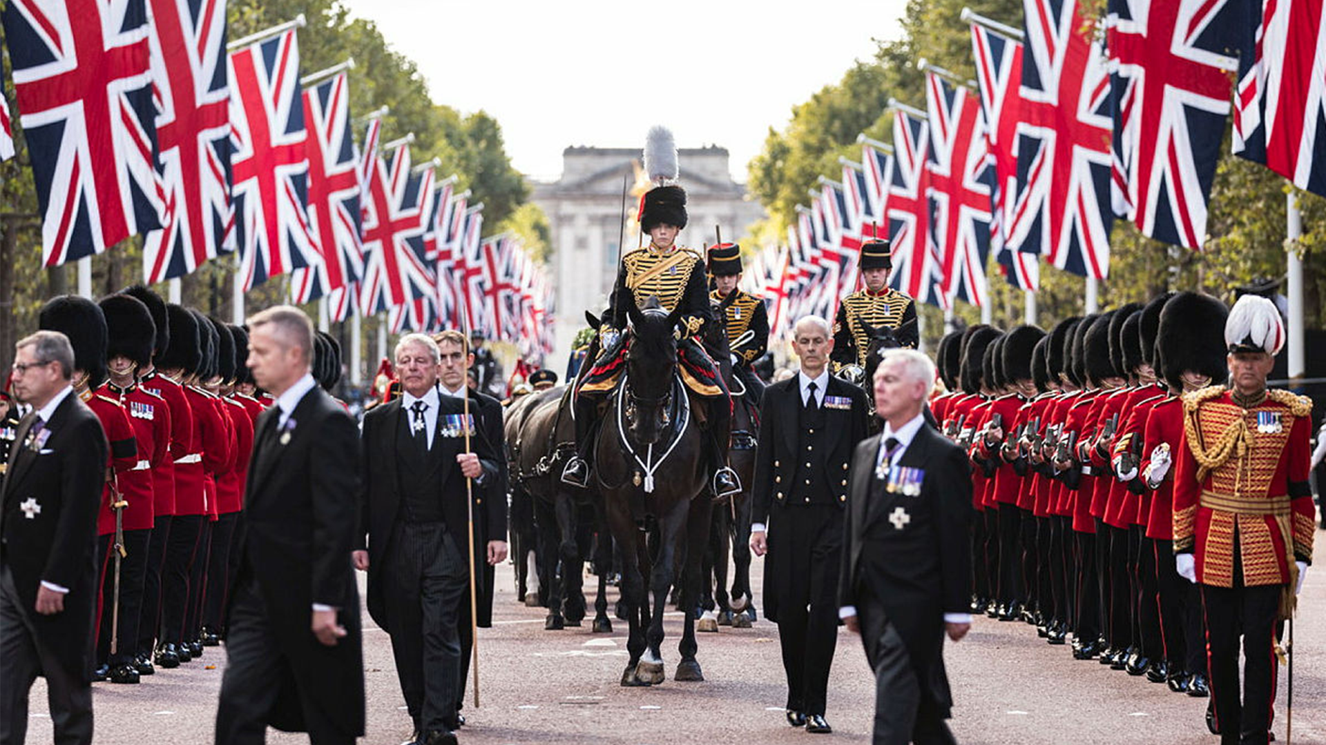 The Procession of Queen Elizabeth II walks up The Mall after leaving Buckingham Palace with the Coffin of Her Majesty Queen Elizabeth II CREDIT MOD