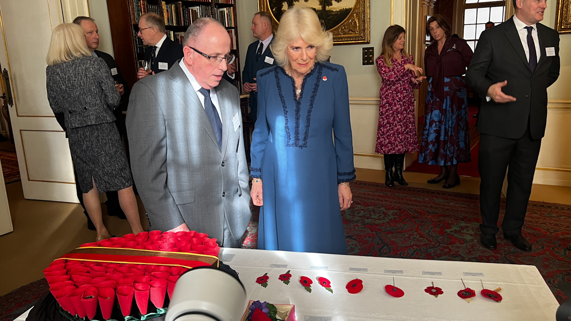 The Queen viewed a small exhibition of poppies and wreaths that showed the evolution of the poppy as a symbol of Remembrance 15022024 CREDIT BFBS