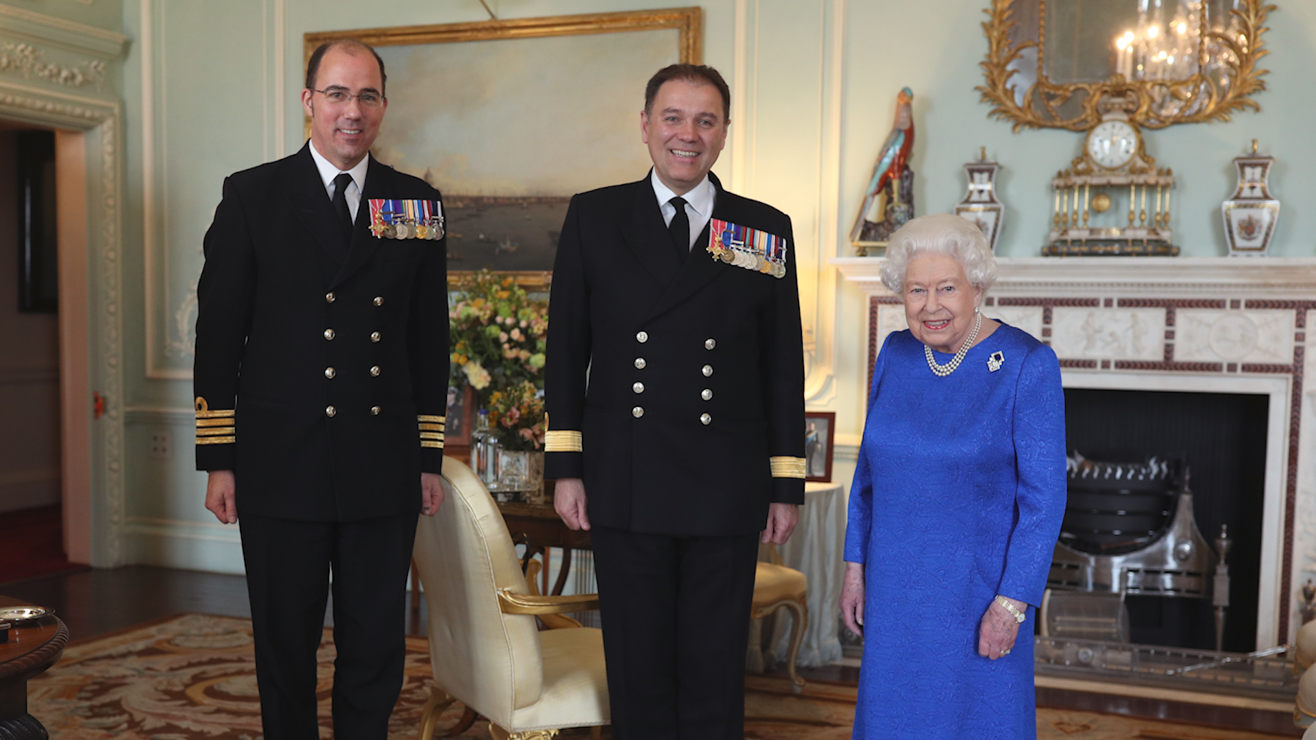 The Queen with Captain Angus Essenhigh (left) and Commodore Steven Moorhouse