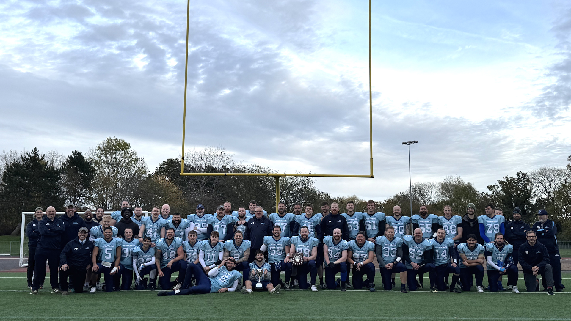 The RAF Mustangs pose after winning the Inter Services American Football Championships