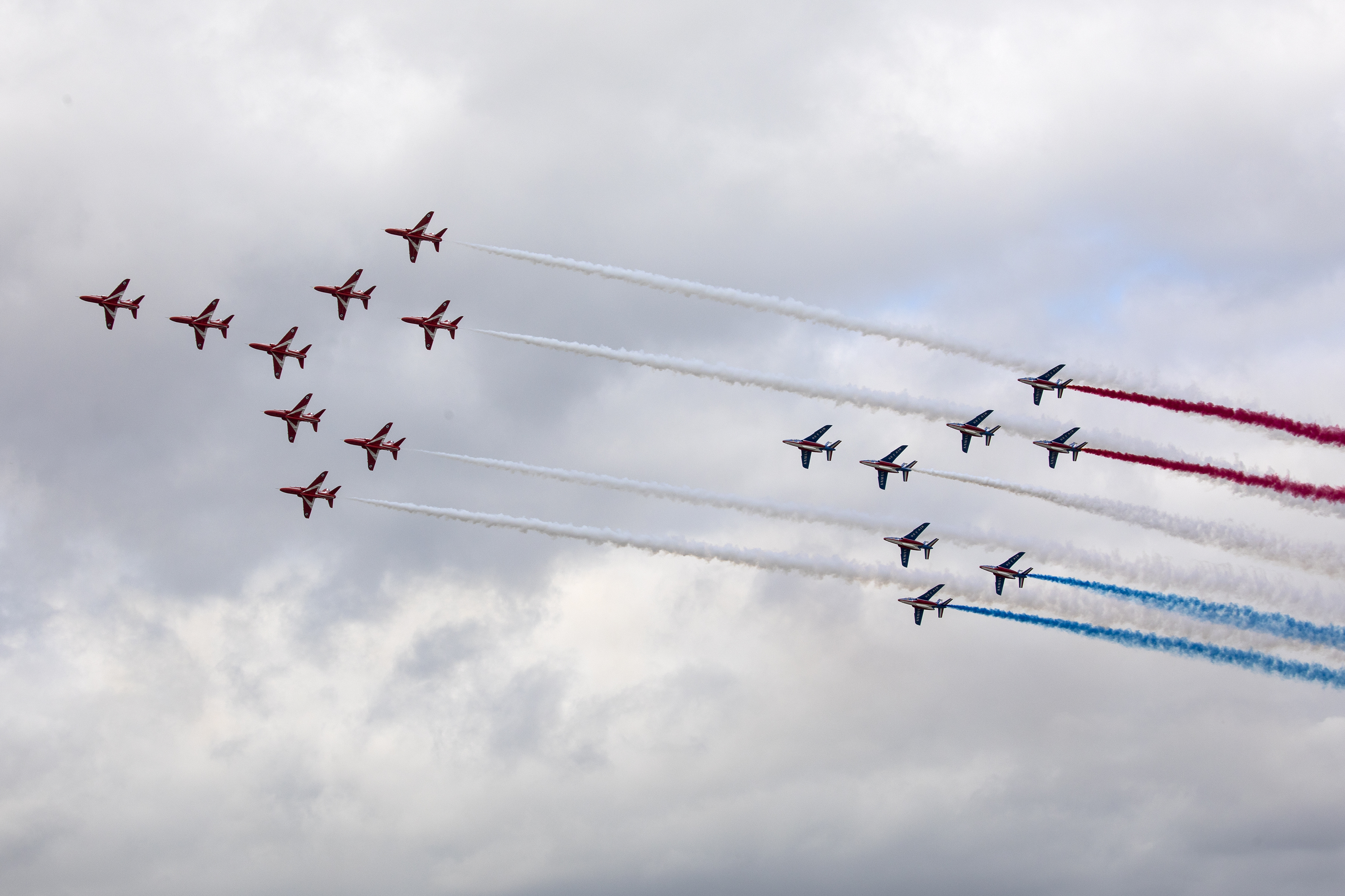 The Red Arrows and La Patrouille de France fly together at the Royal International Air Tattoo 20th July 2019 170620 CREDIT MOD
