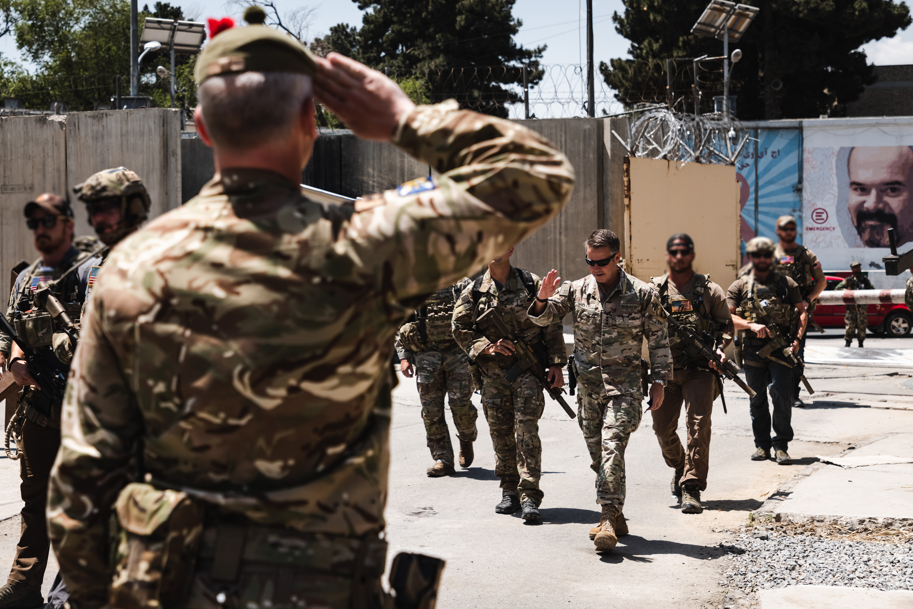 The Regimental Sergeant Major 3rd Battalion The Royal Regiment of Scotland salutes United States Army General Austin Scott Miller at flag lowering ceremony at New Kabul Compound Afghanistan 28052021 CREDIT MOD.jpg
