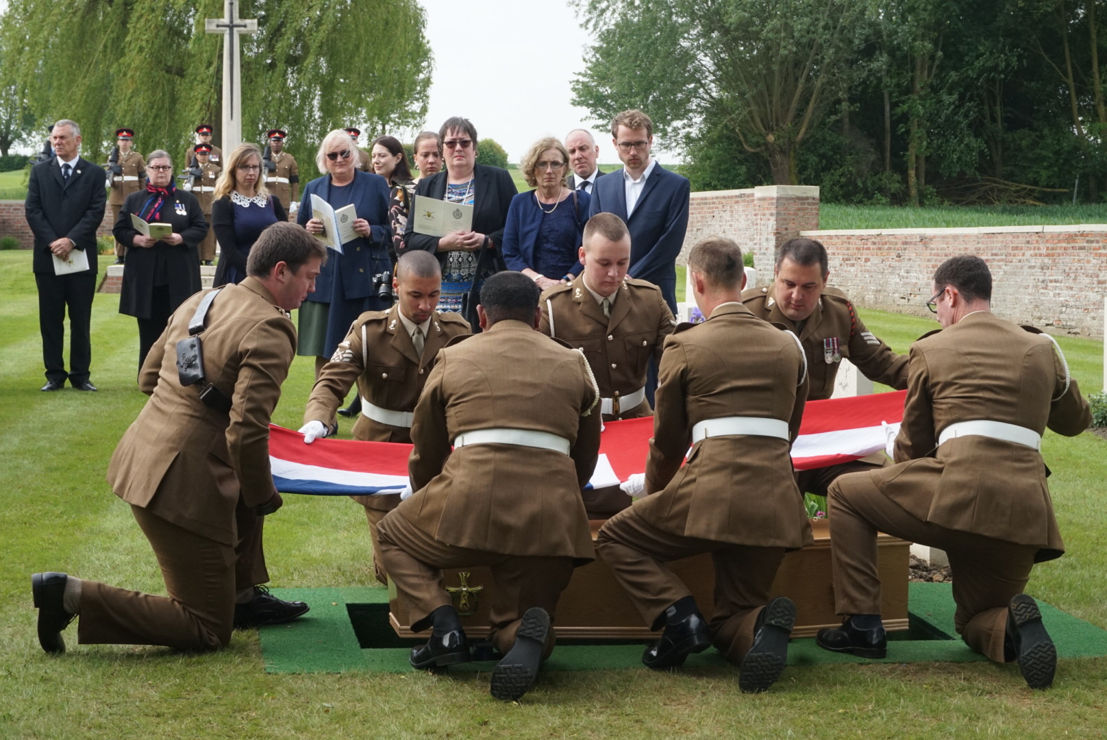The Royal Artillery Regiment bearer party ceremonially fold the Union Flag during the service (Crown Copyright)
