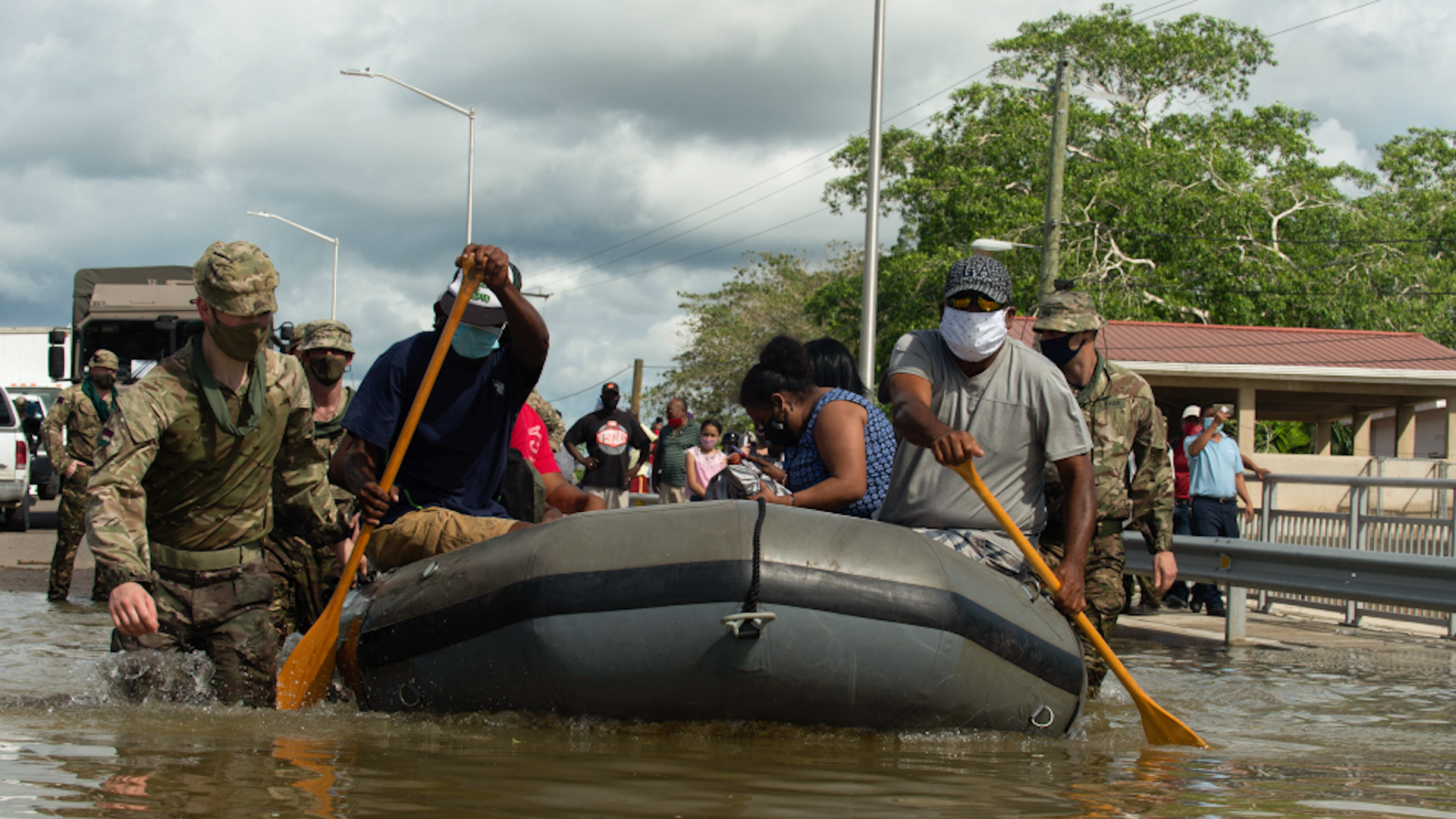 British troops help locals in Belize after flooding caused by the storm. (Picture: MOD).