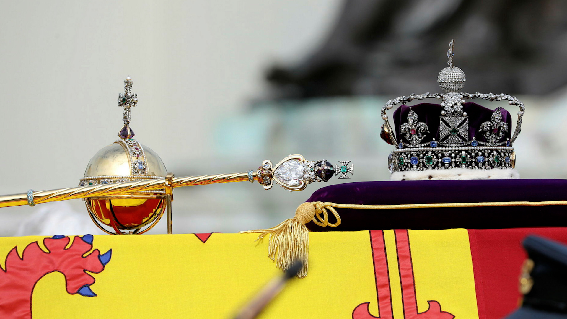 The State Crown, Orb and Sceptre on top of Queen Elizabeth II's coffin during funeral procession