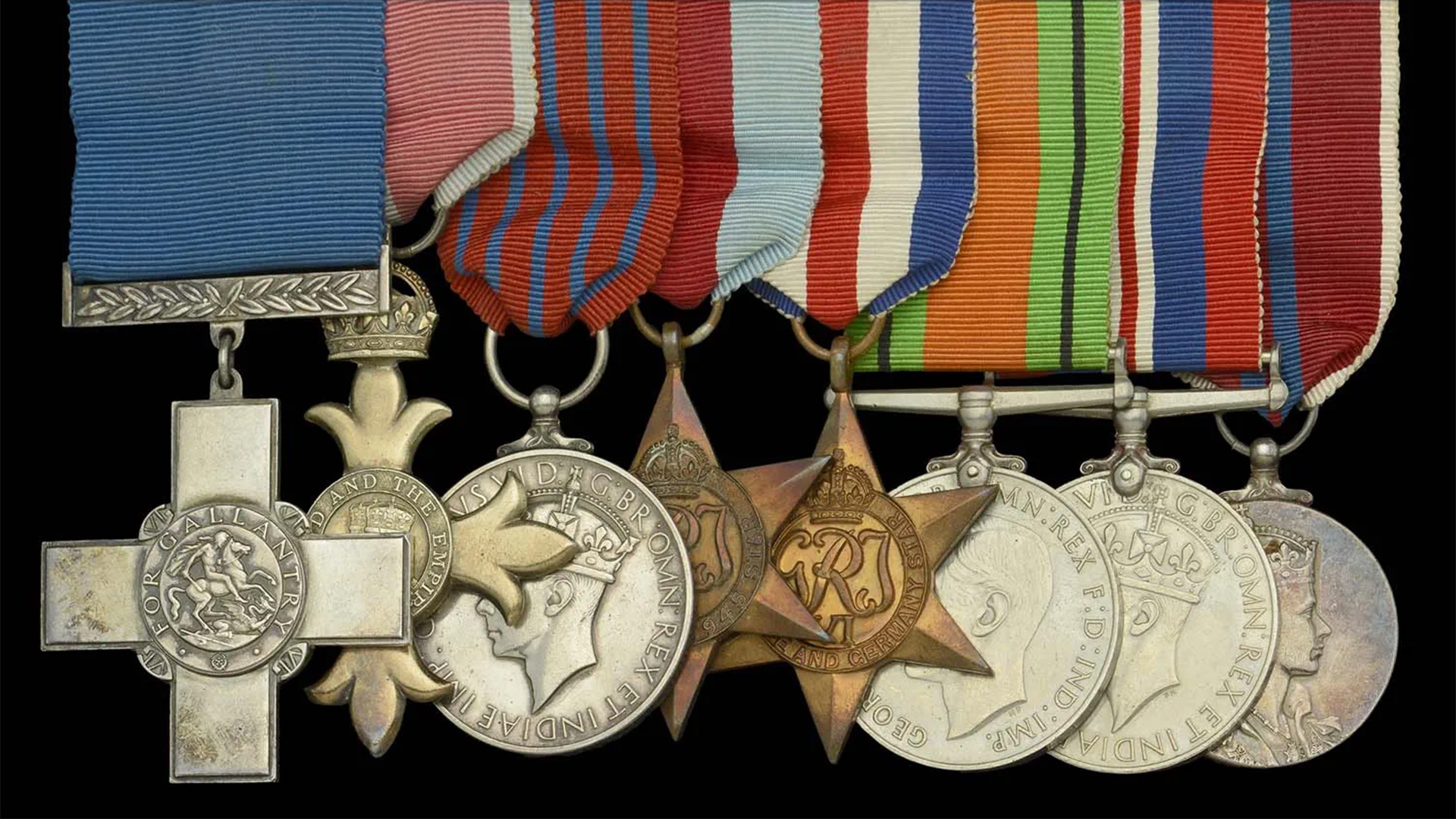 The set of eight medals belonging to Lt Commander Mick Gidden included the George Cross and George Medal