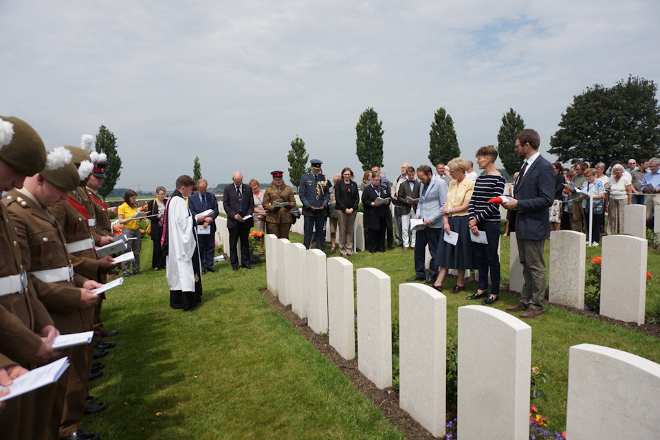 The family of Capt Kington  participate in the rededication service 