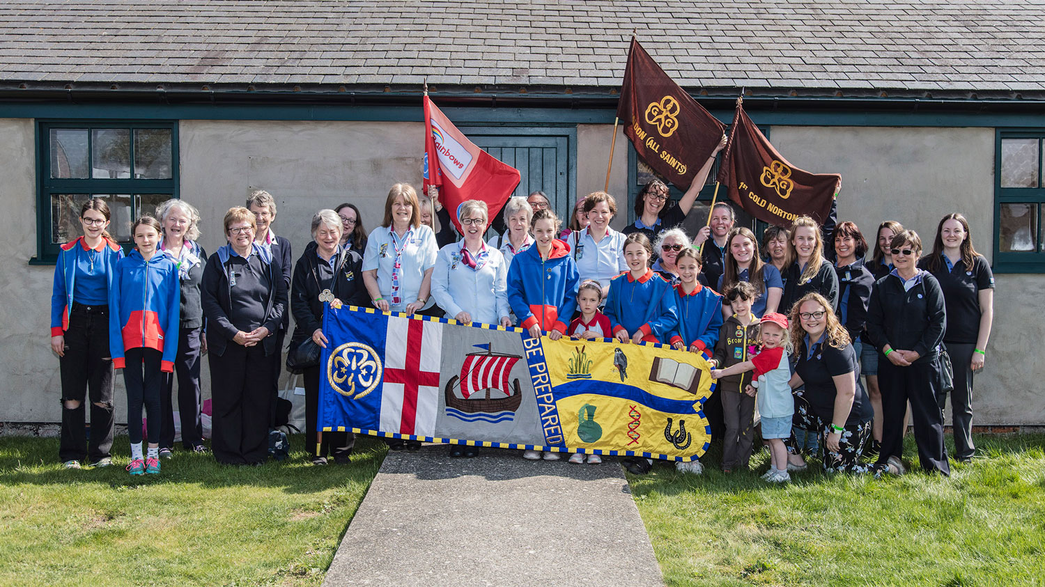 The Rangers Guides Brownies and Rainbows outside the Stow Maries Great War Aerodrome museum CREDIT Mr Dave Davies of SMGWA