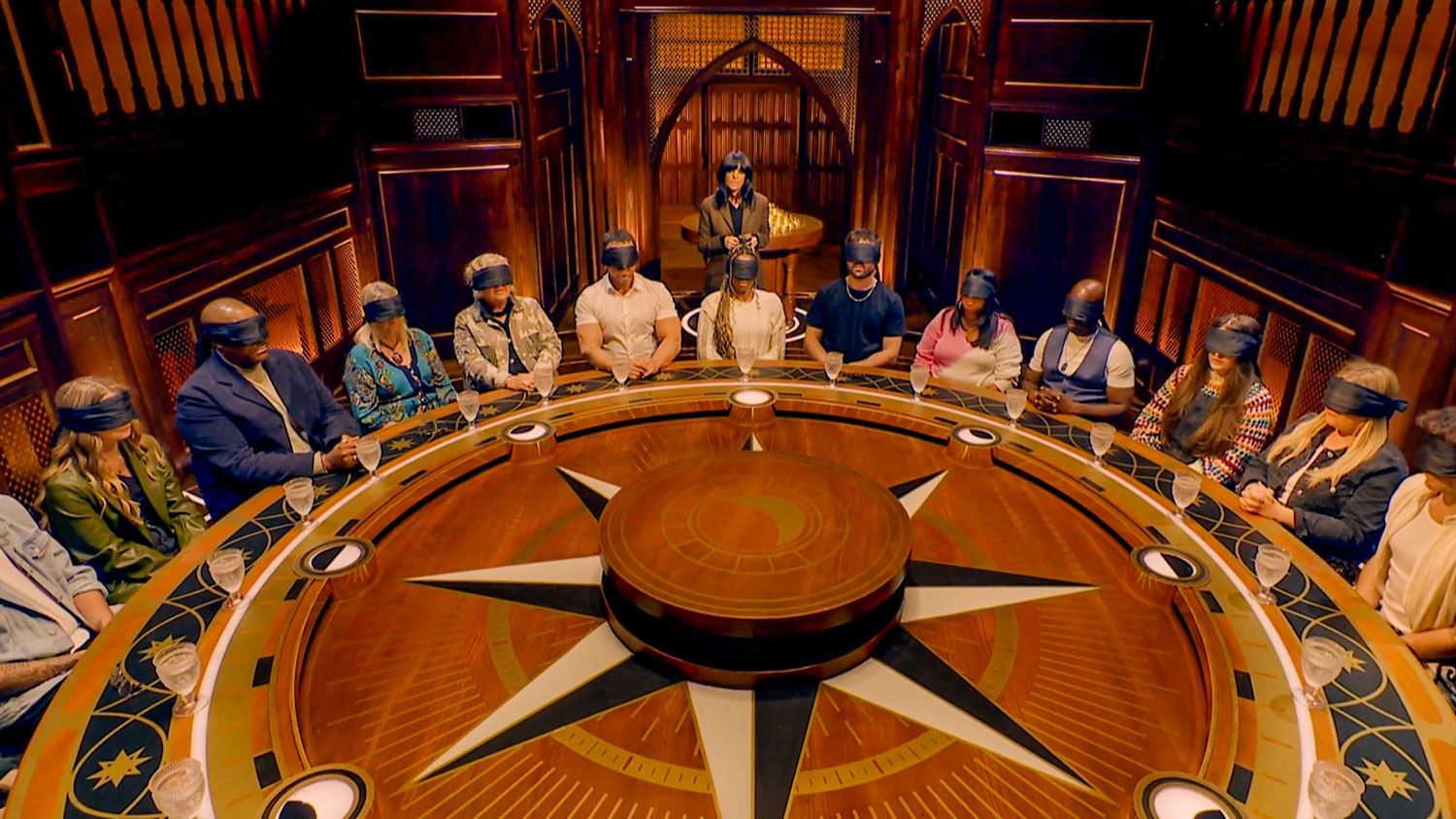 The Traitors II Claudia Winkleman with the contestants in episode one CREDIT BBC Studio Lambert
