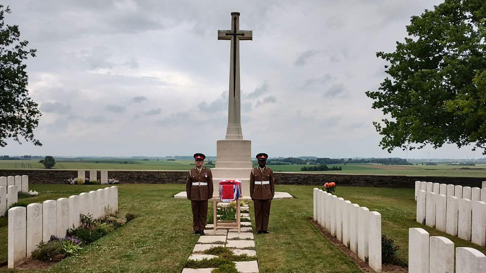 The coffin was placed on trestles by the cross of sacrifice and guarded by serving Gunners prior to the service CREDIT Crown Copyright