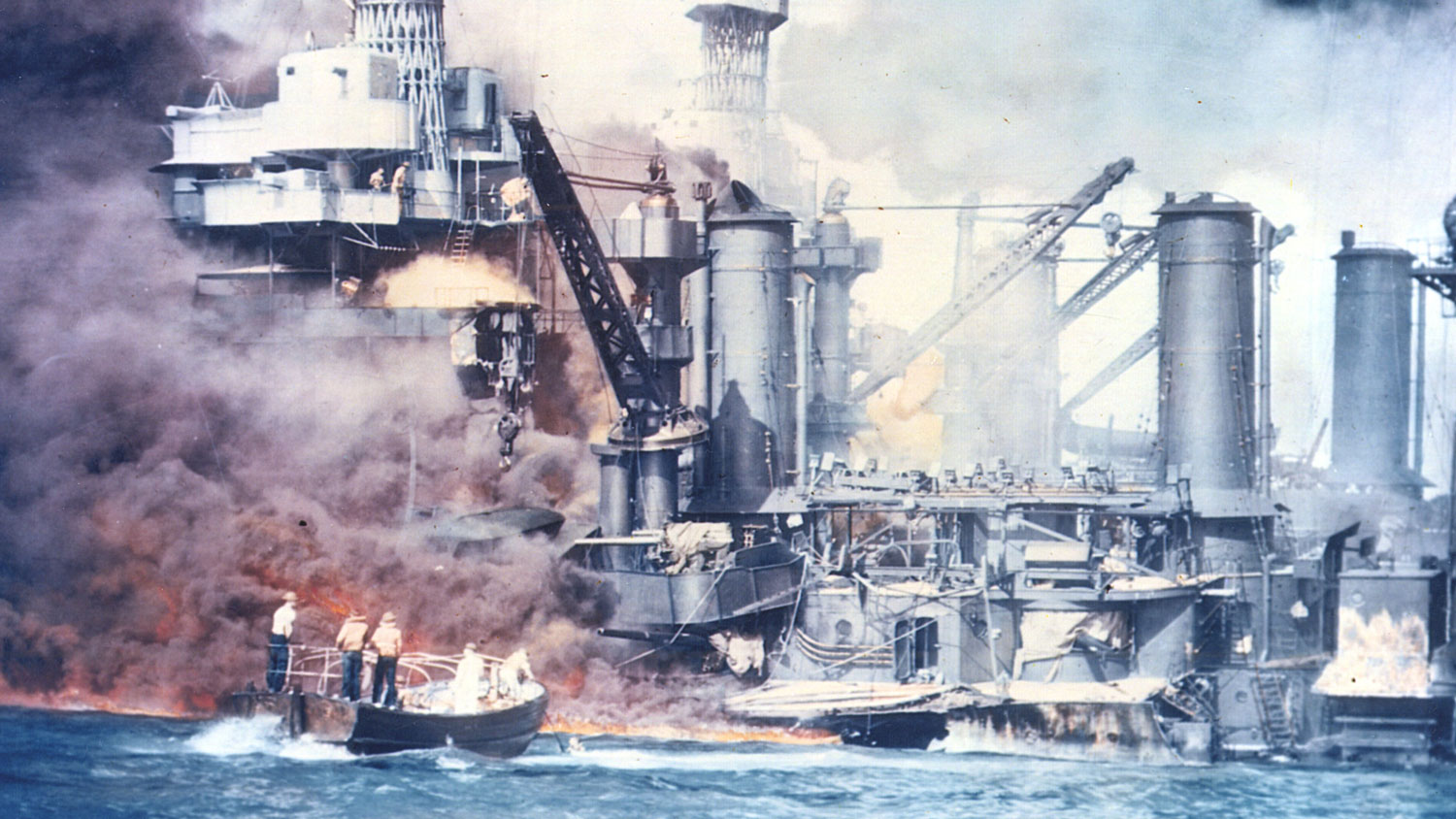 Thick smoke rolls out of a burning ship during the attack on Pearl Harbor on 7 December 1941 CREDIT US National Archives and Records Administration