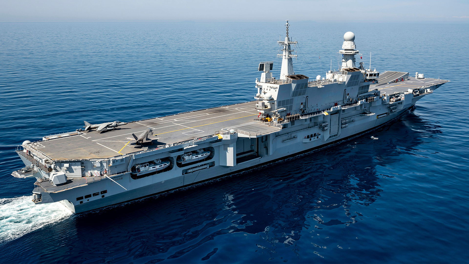 This shot of the Cavour shows a Harrier alongside an F-35B, but the ship's complement is now purely Lightnings