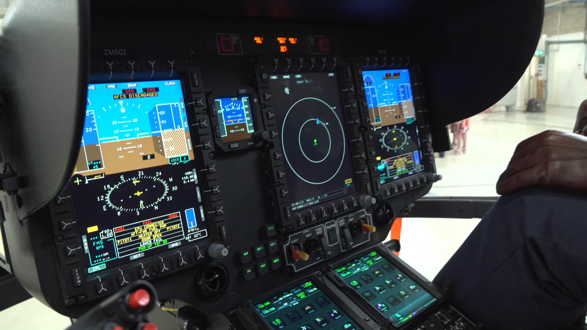 The new helicopters used by the students have modern touch-screen avionic displays.