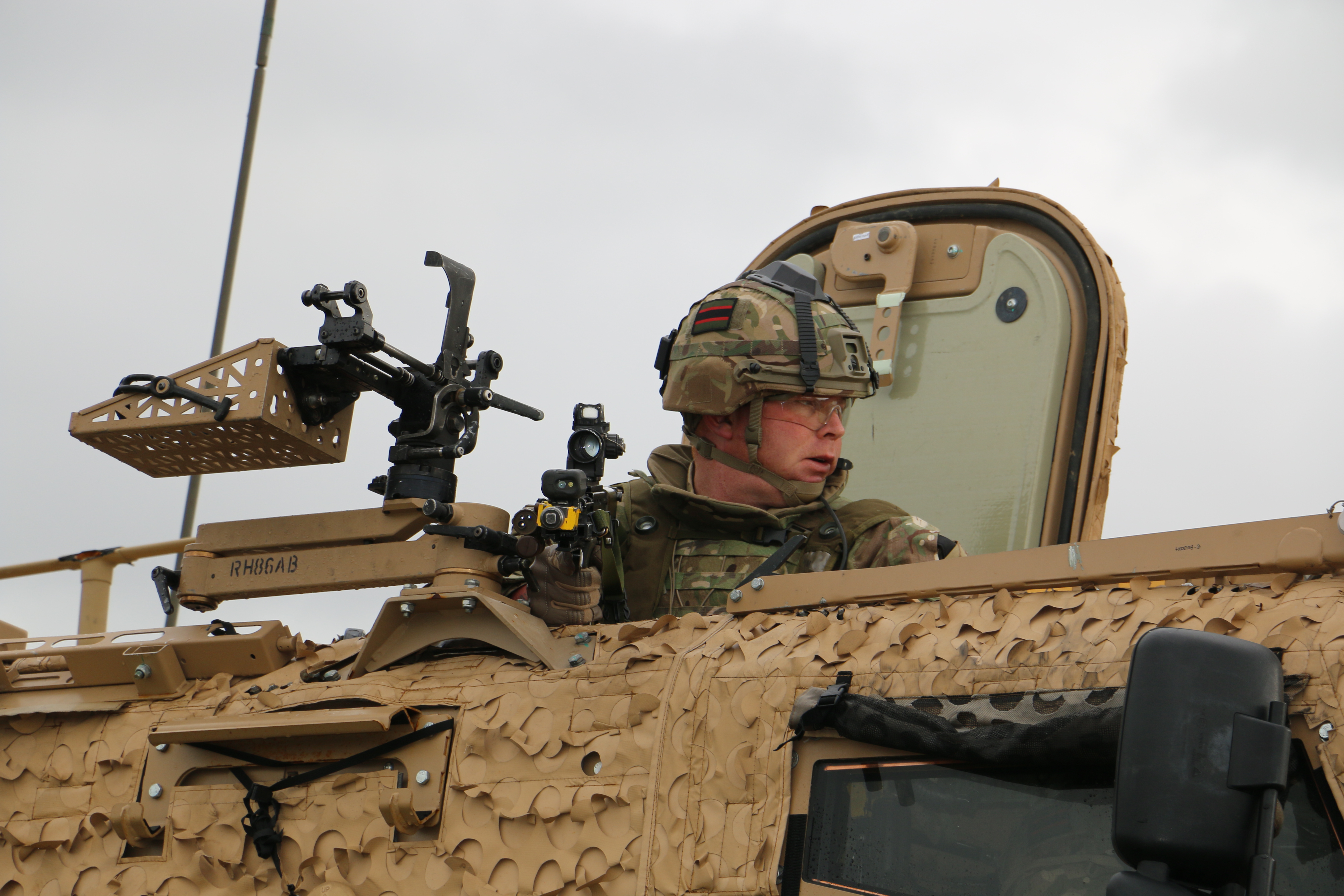 Troop in control of a Foxhound vehicle 060319 CREDIT BFBS