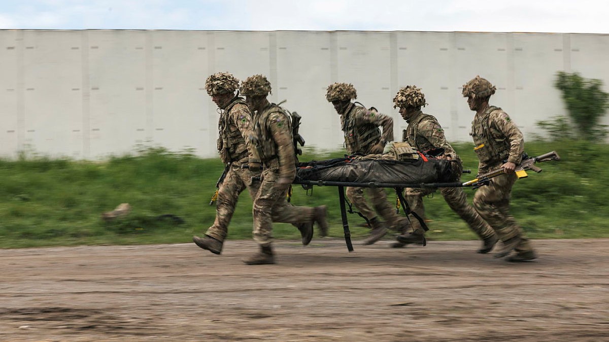 Troops from 2 ROYAL YORKS evacuate a casualty dummy to the landing zone during Exercise Wessex Storm 10052023 CREDIT MOD