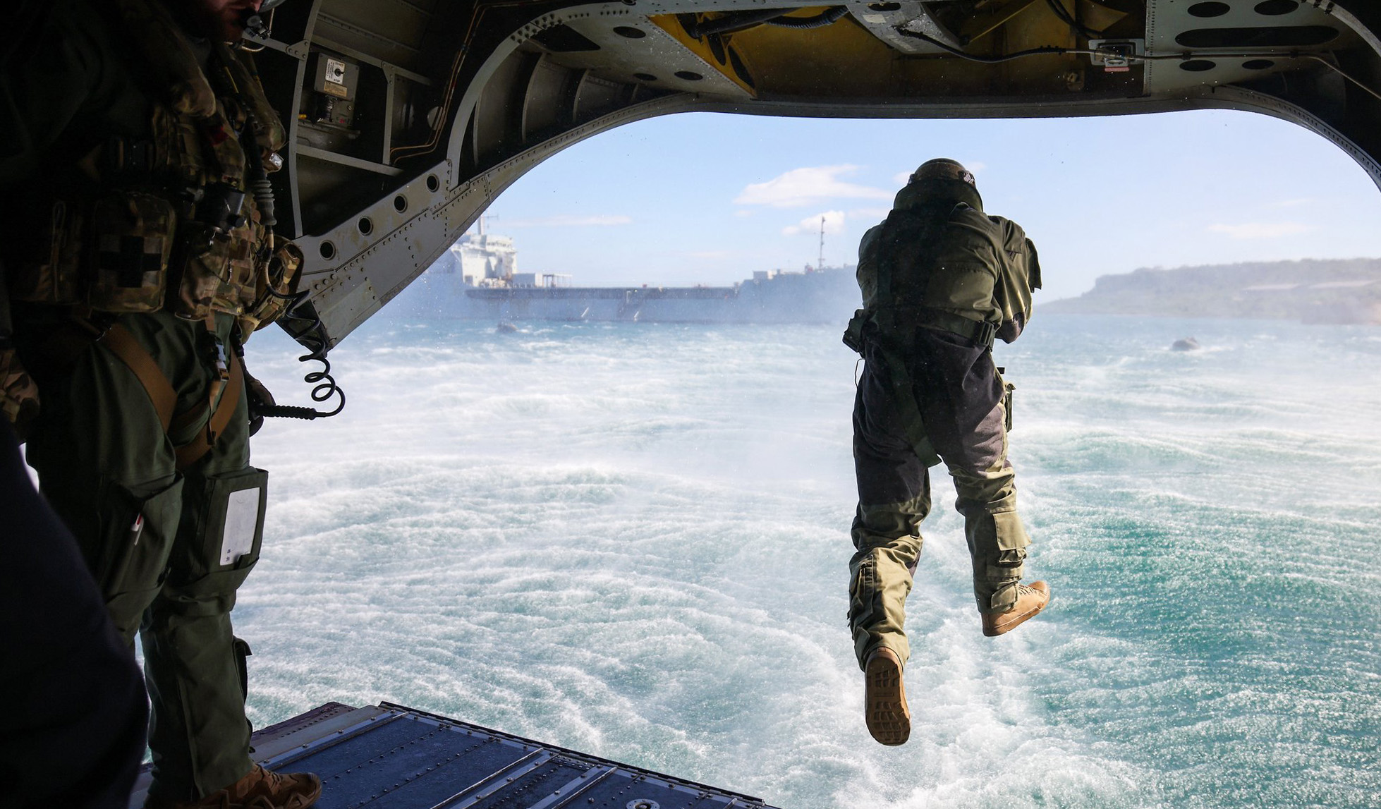 A marine from M company of 42 Commando makes the leap
