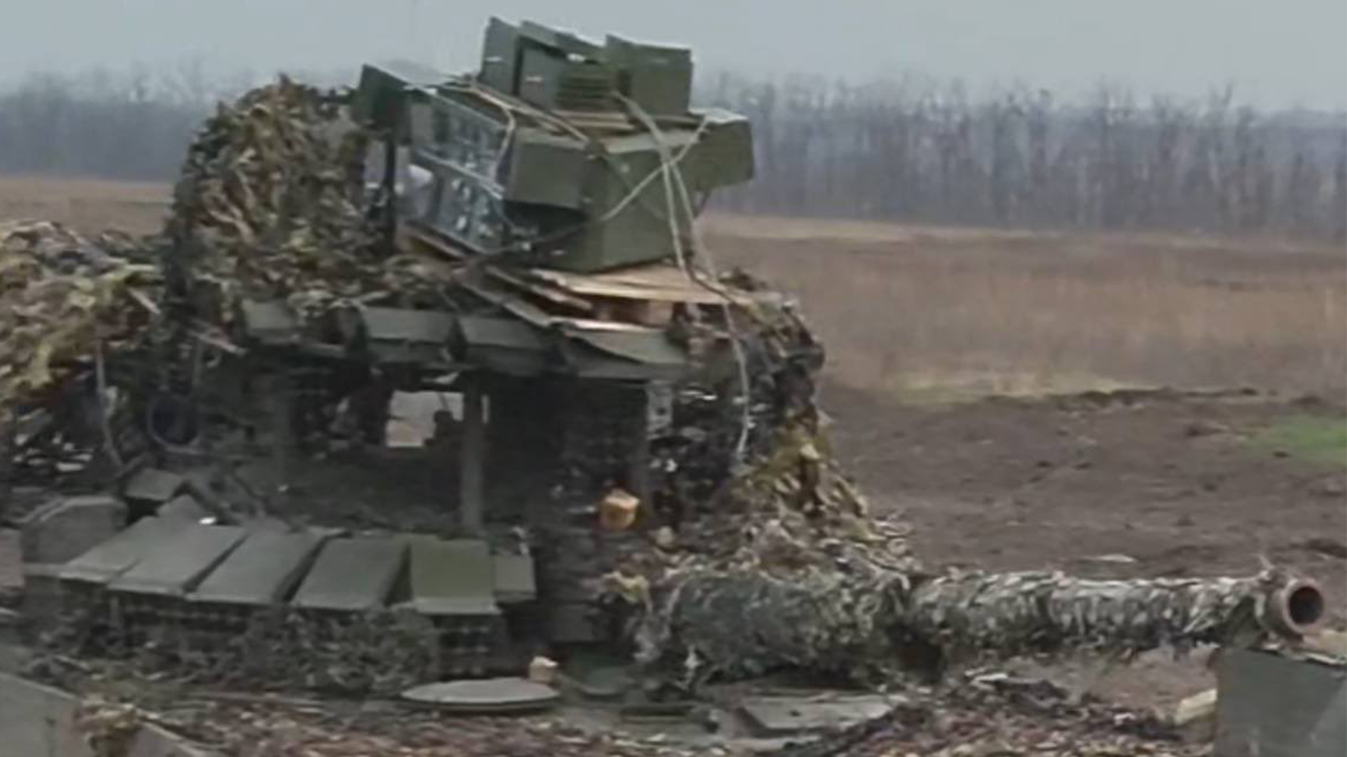 The Russian T-72B3M had had a field conversion carried out so it could counter drones - it was crude, but apparently effective (Picture: Azov)