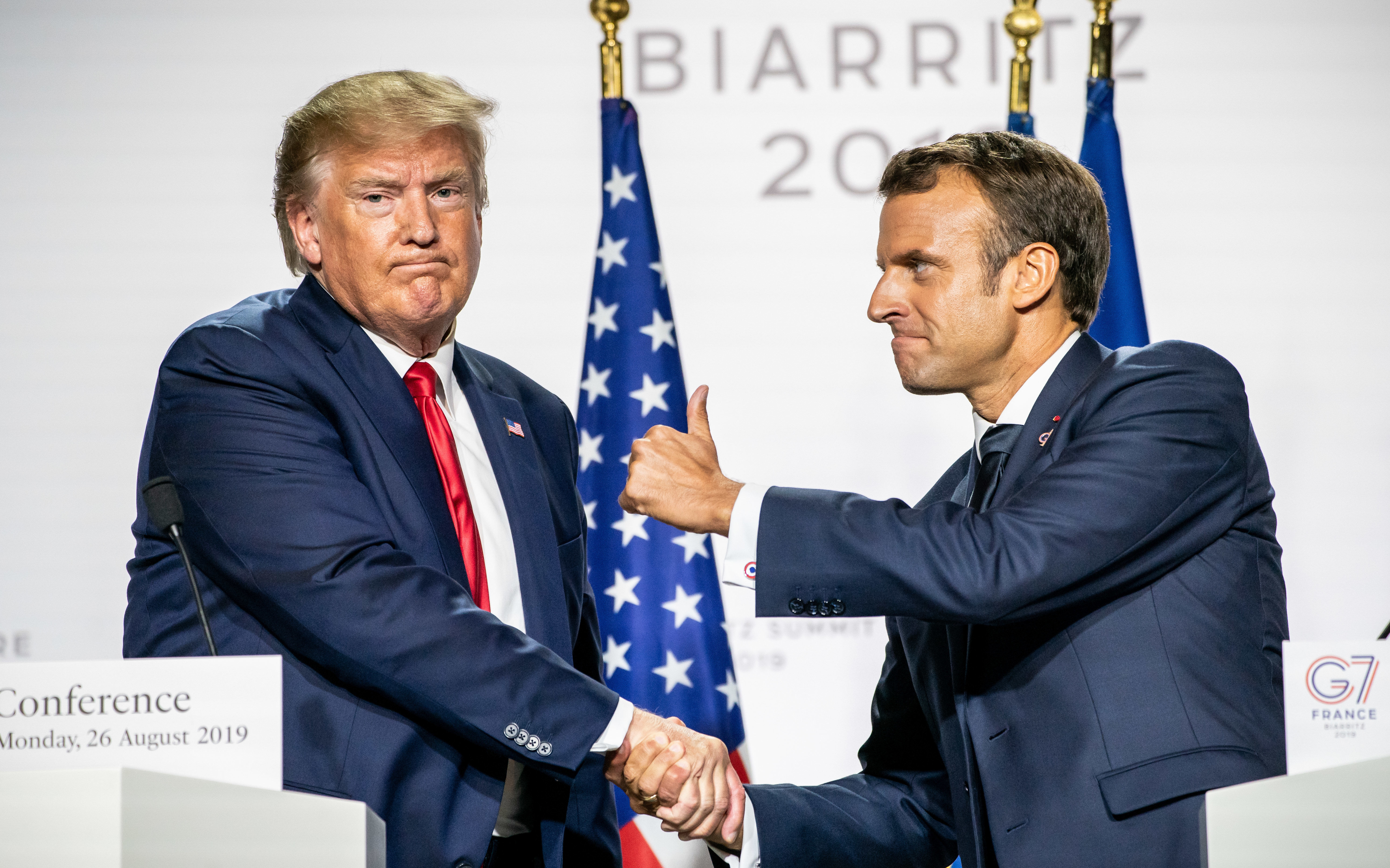 Trump and Macron shake hands at G7 in France 260819 CREDIT PA.jpg 
