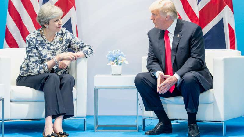 Theresa May pictured alongside President Trump