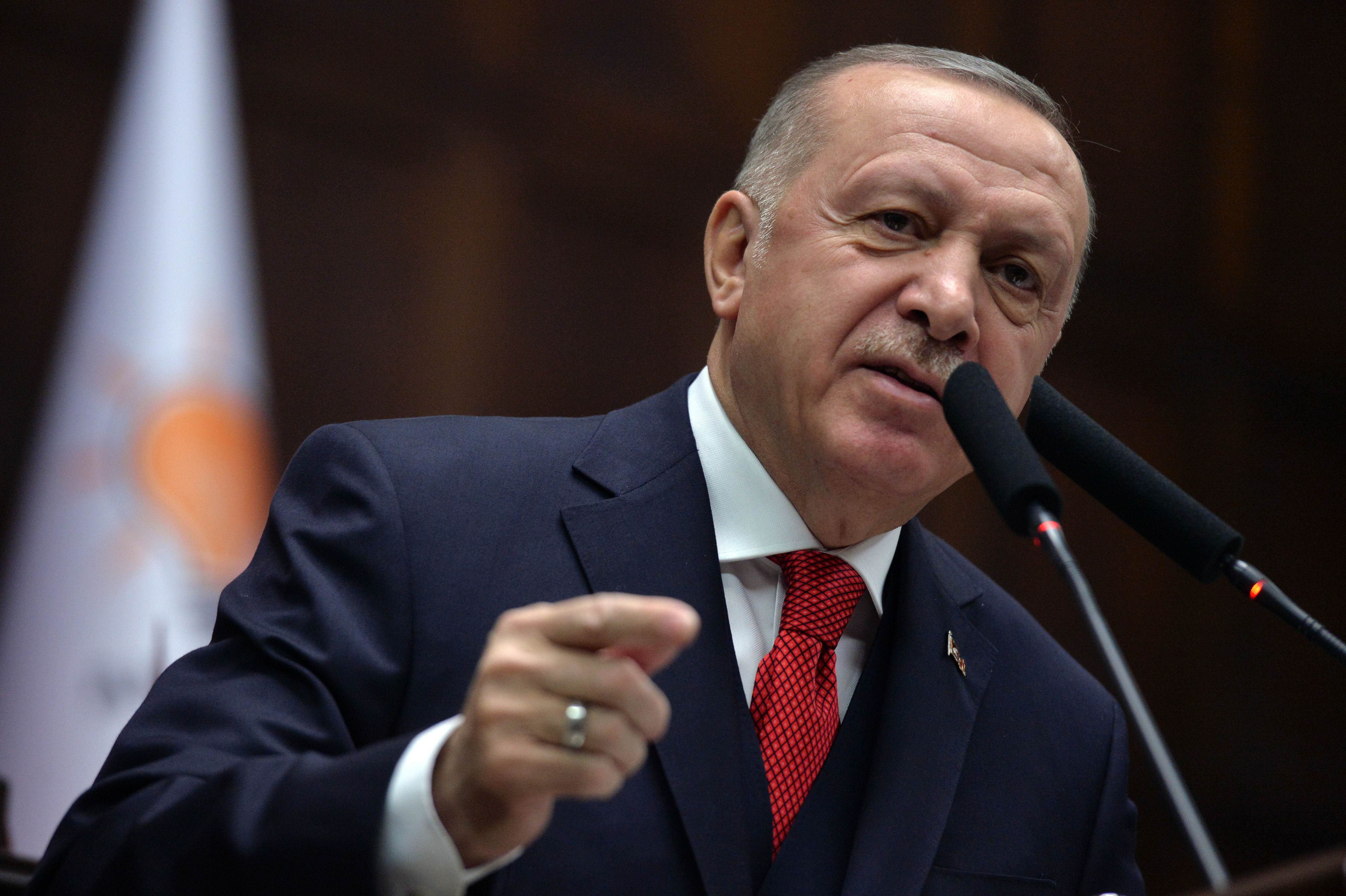Turkish President Recep Tayyip Erdogan speaks to his party members at the parliament in Ankara 190120 CREDIT PA.jpg