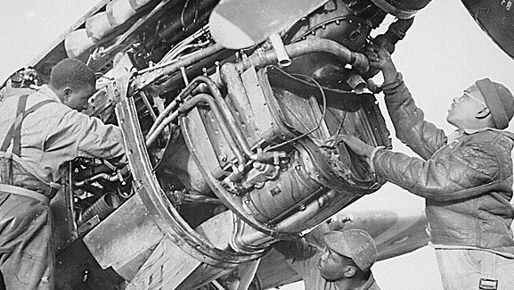 Tuskegee Airmen mechanics for 99th Fighter Squadron, George Johnson and James C. Howard CREDIT National Archives and Records Administration.jpg