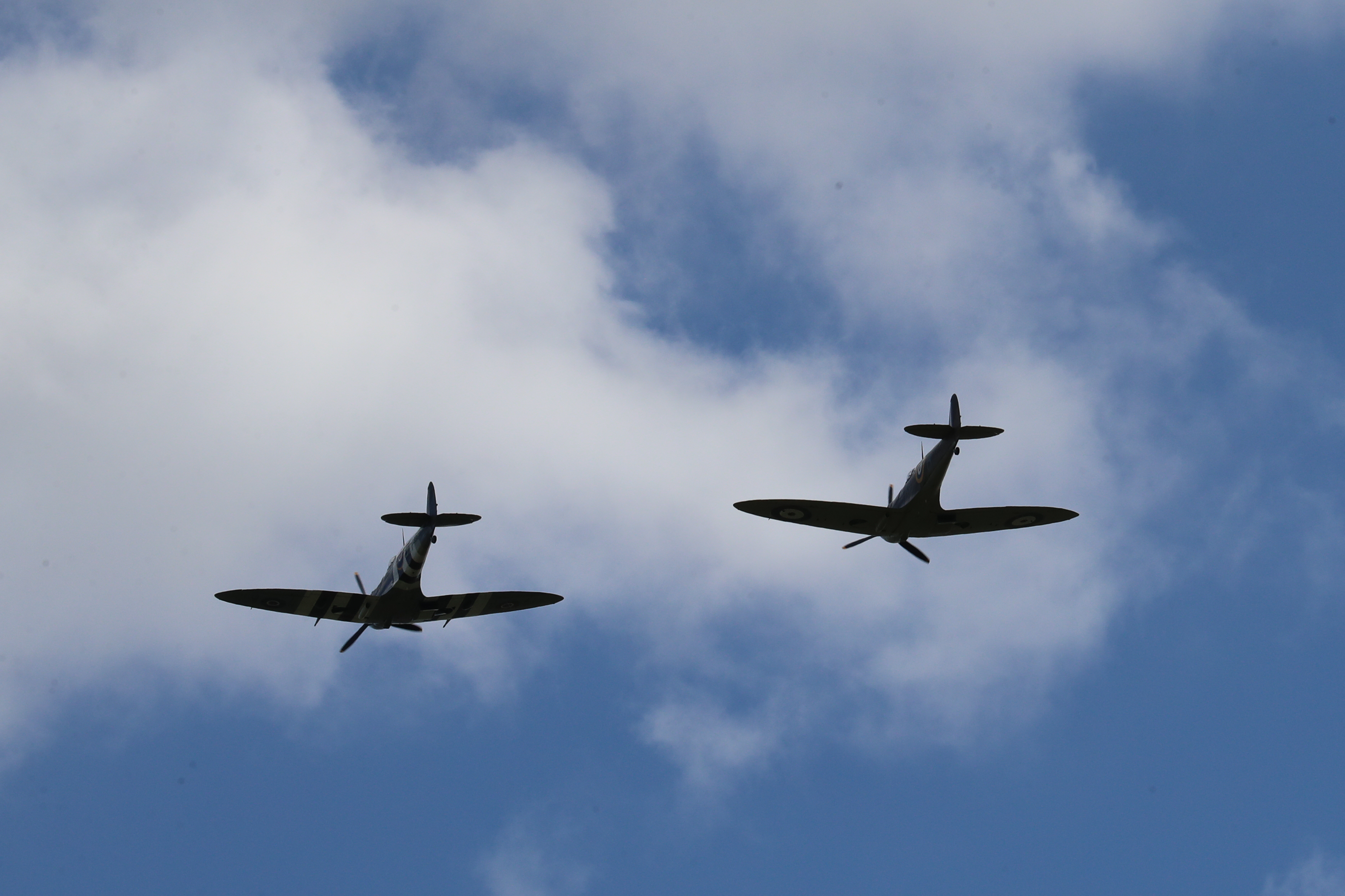 Two Battle of Britain Memorial Flight Spitfires fly over Ditchling in honour of Dame Vera Lynn