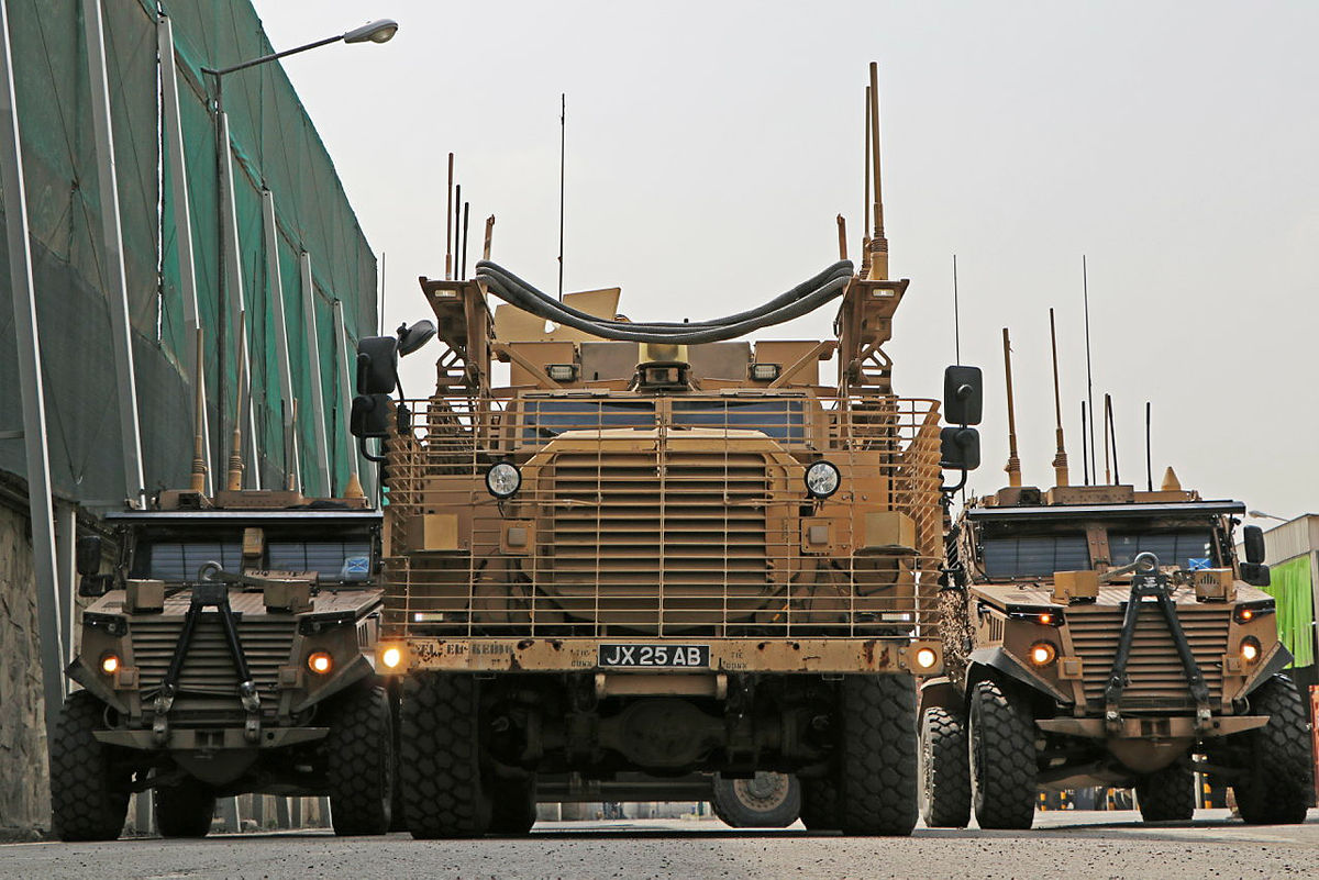 Two of the vehicles that Ukrainian troops are being trained to use - Mastiff (centre) and Foxhound (left and right)
