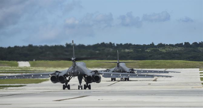 Two U.S. Air Force B-1B Lancers assigned to the 37th Expeditionary Bomb Squadron, deployed from Ellsworth Air Force Base, South Dakota, prepare to take off from Andersen Air Force Base, Guam