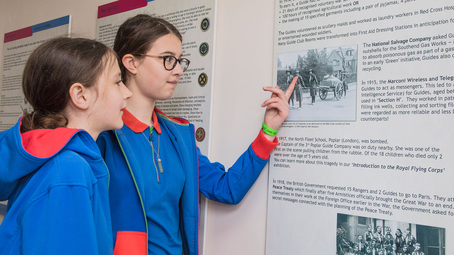 Two Girl Guides enjoying the Guiding The Empire exhibition CREDIT Mr Dave Davies of SMGWA