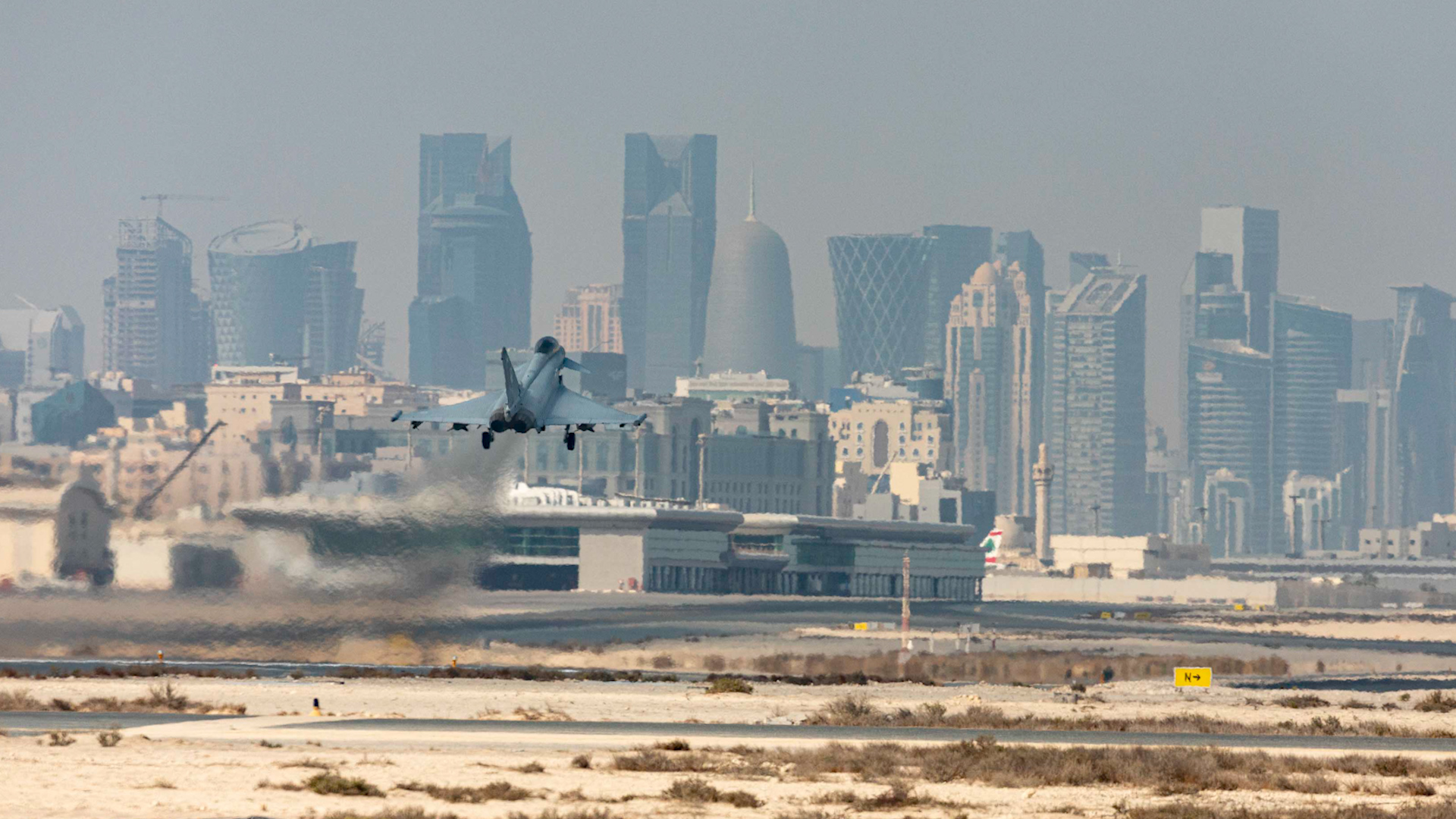 A Typhoon from 12 Squadron overlooking the Doha skyline in November (Picture: MOD).